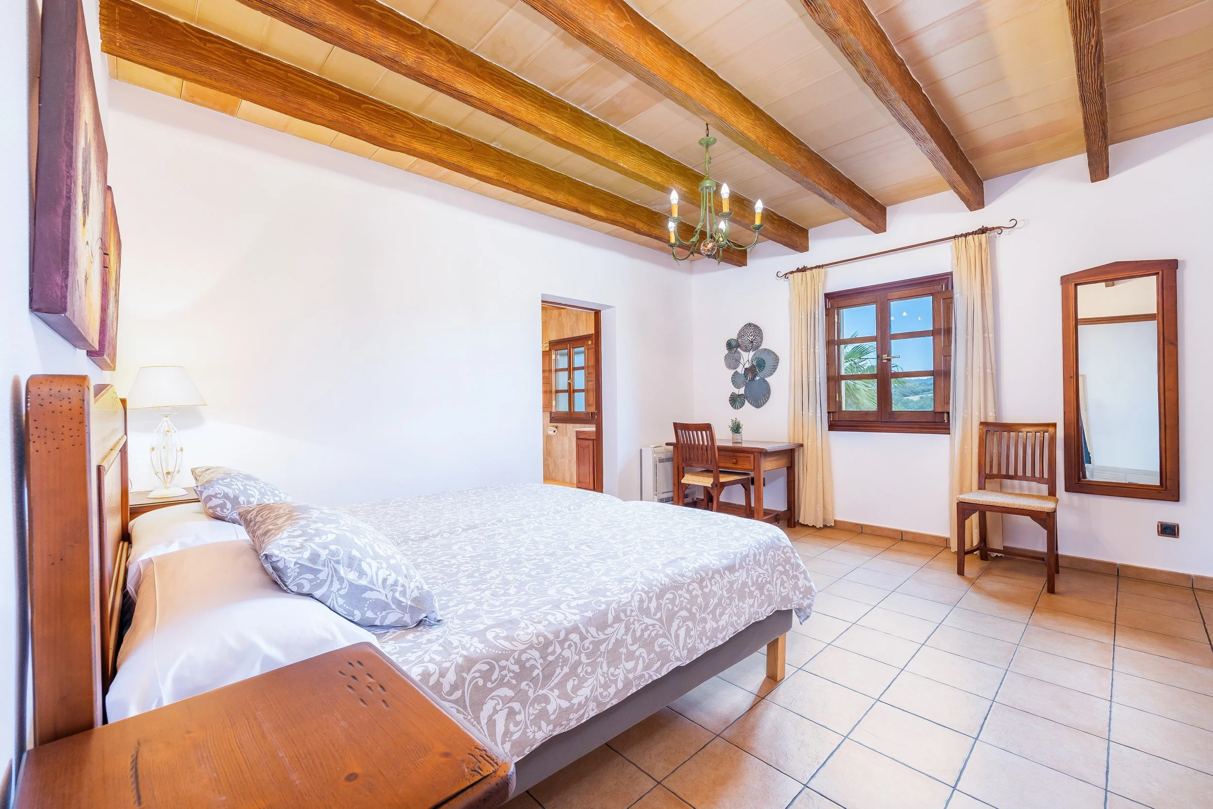 Traditional interior of Cas Cuni Mallorca with rustic architecture and natural light real estate photography