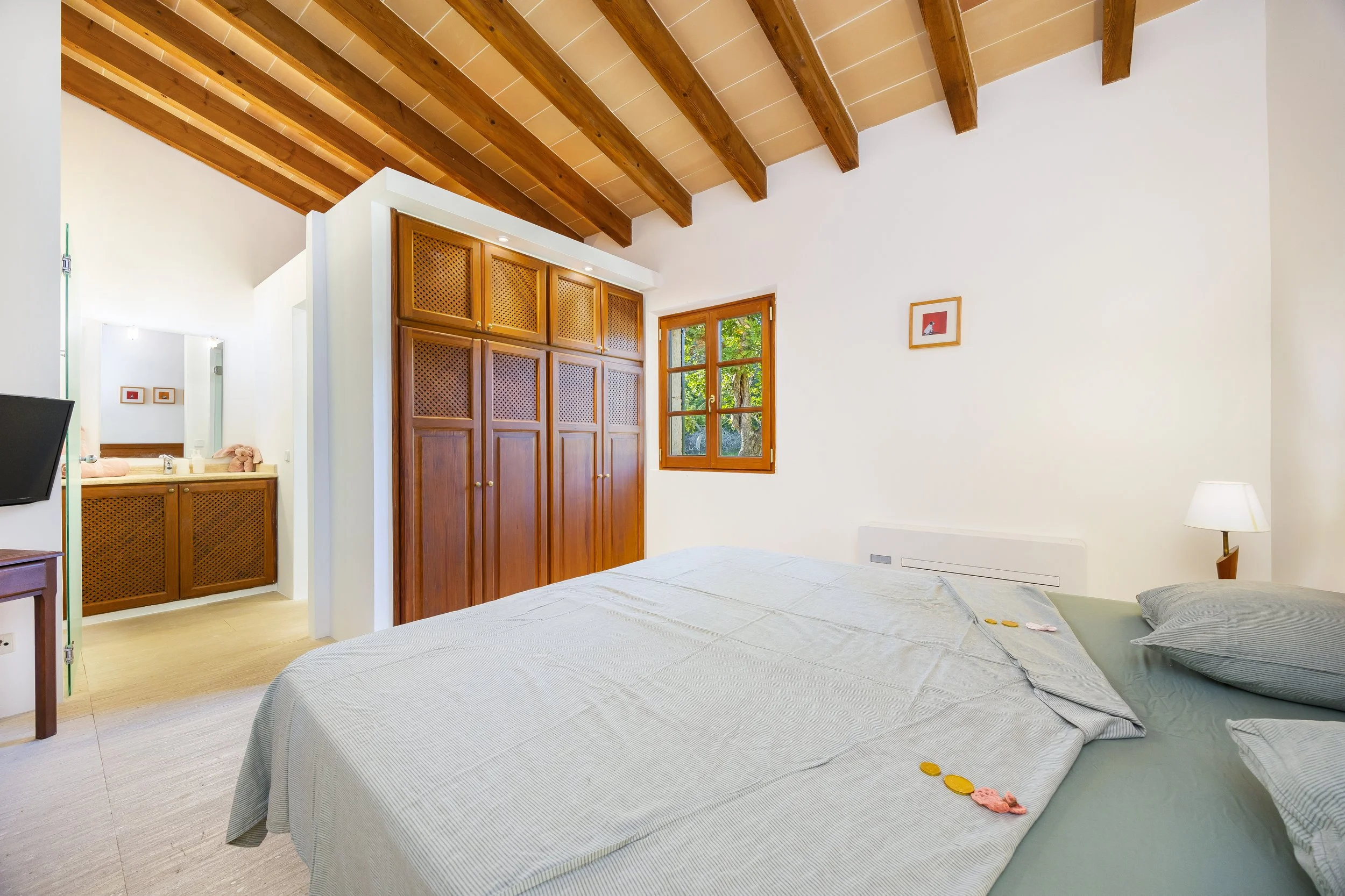 Traditional finca interior near Sant Llorenç Mallorca with rustic architecture and natural light real estate photography