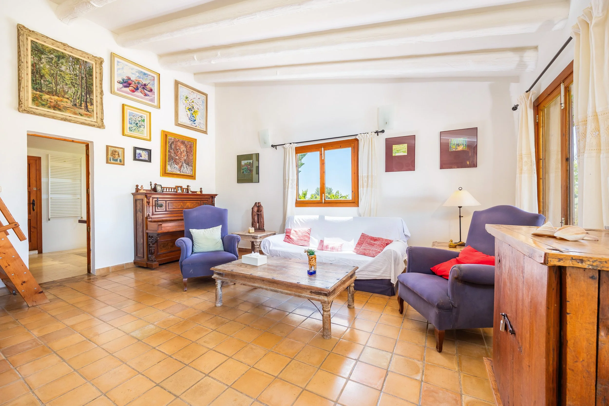 Rural house interior with natural light and traditional Mediterranean style real estate photography in Mallorca