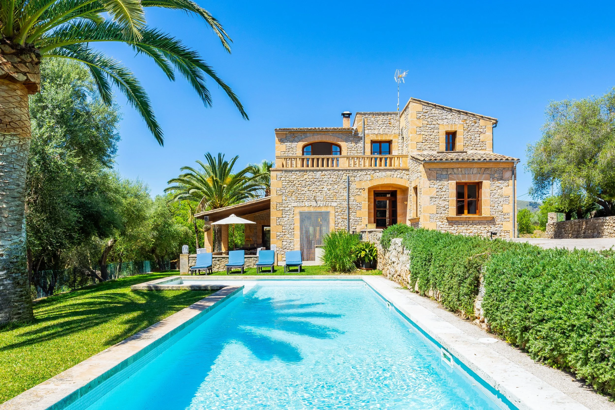 Traditional Mallorcan house with swimming pool near Artà surrounded by countryside real estate photography