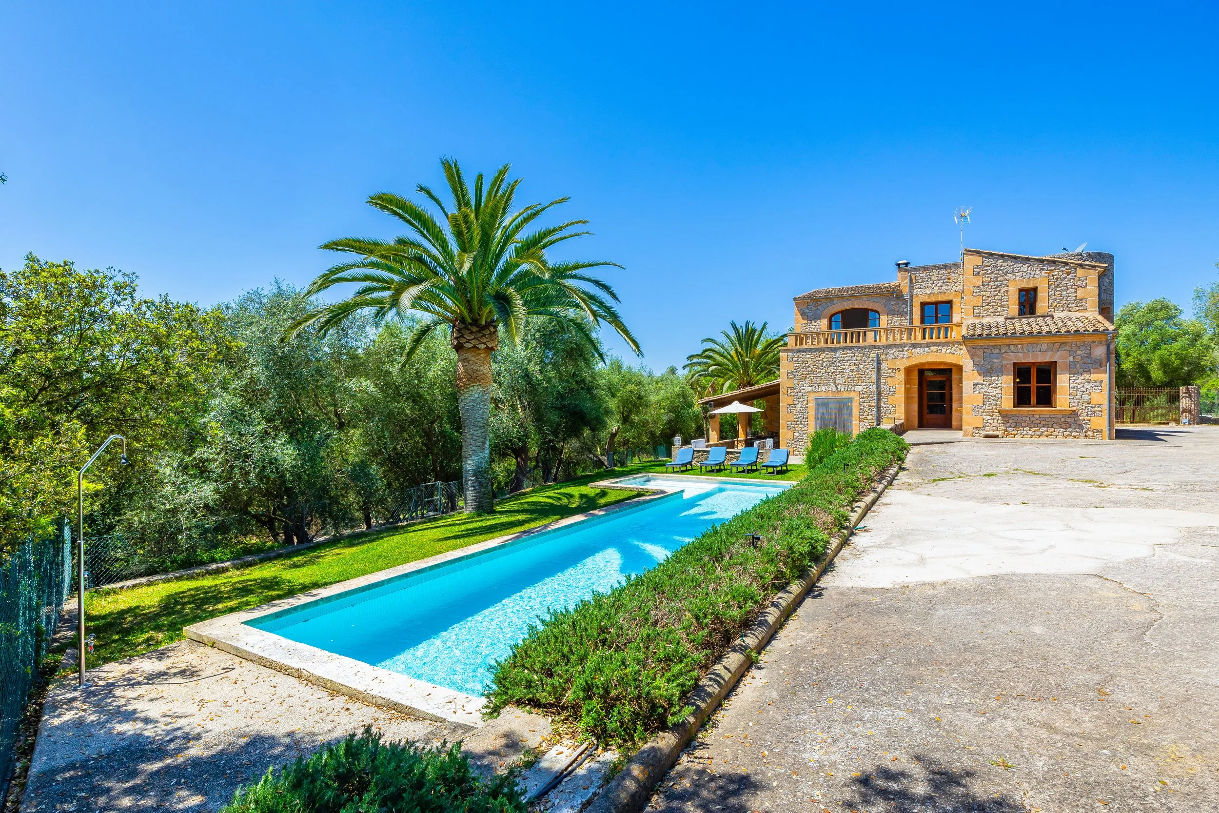 Traditional Mallorcan house with swimming pool near Artà surrounded by countryside real estate photography
