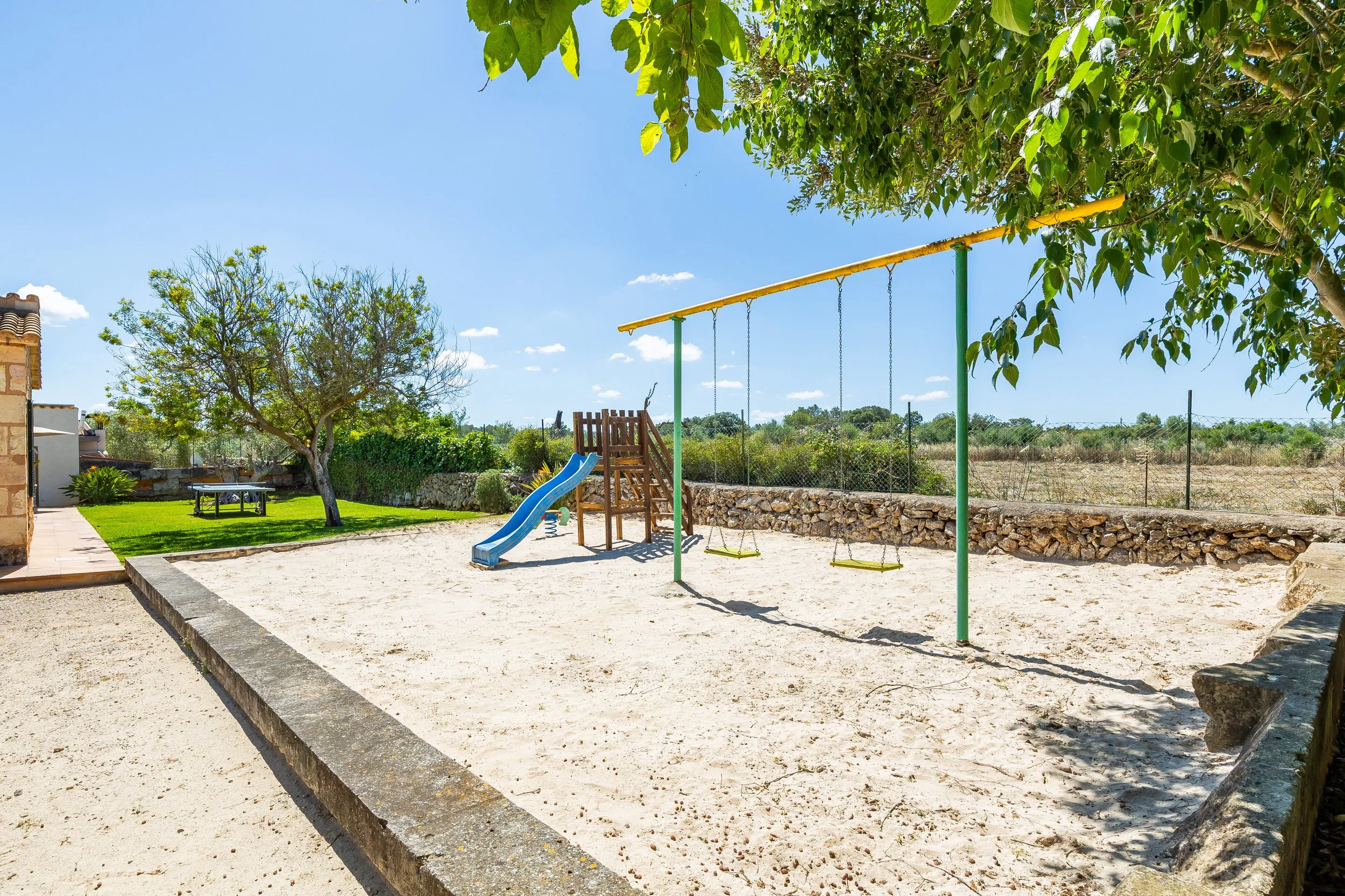 Sa Finca Mallorca finca exterior with pool, garden and family leisure area real estate photography