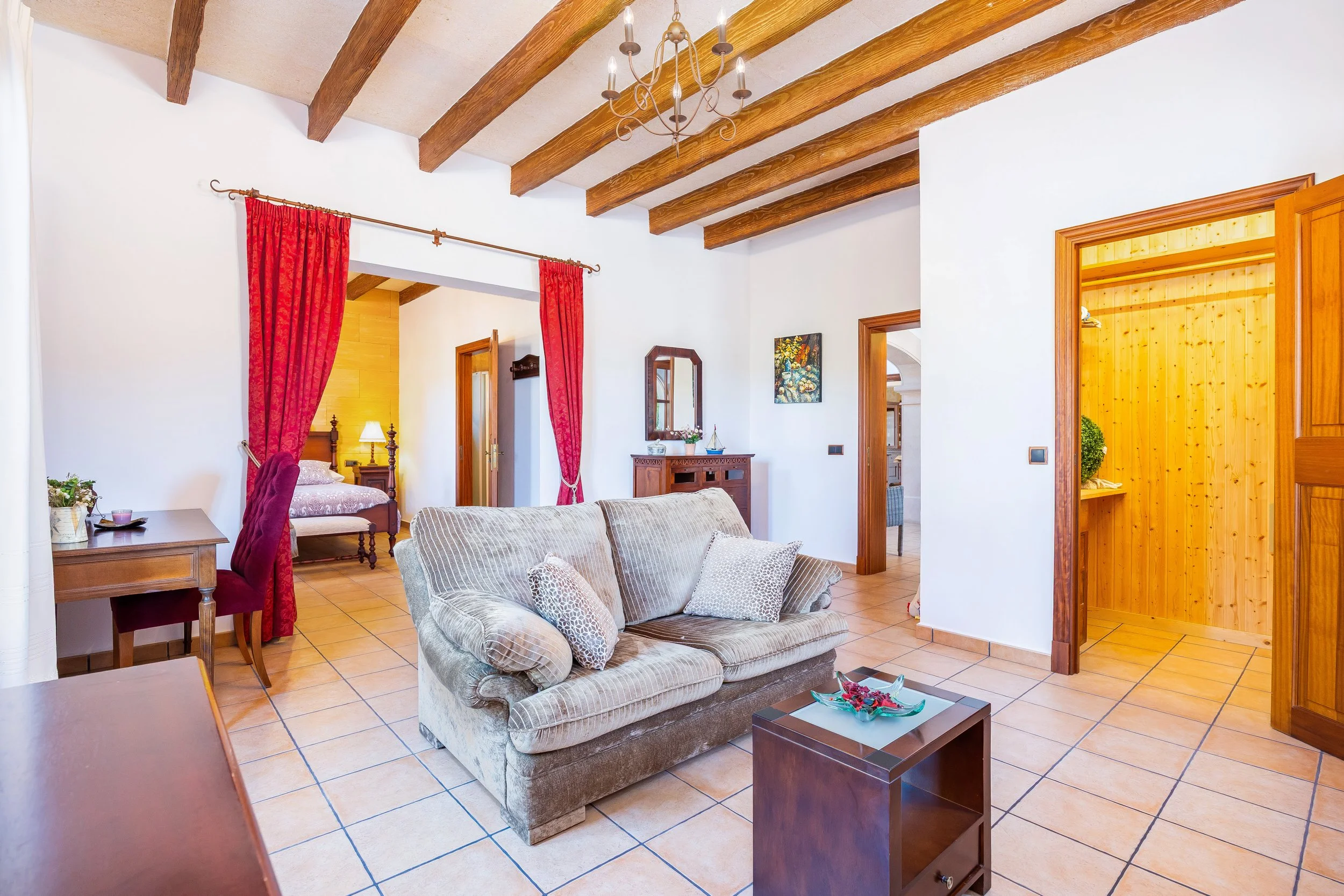 Traditional interior of Cas Cuni Mallorca with rustic architecture and natural light real estate photography