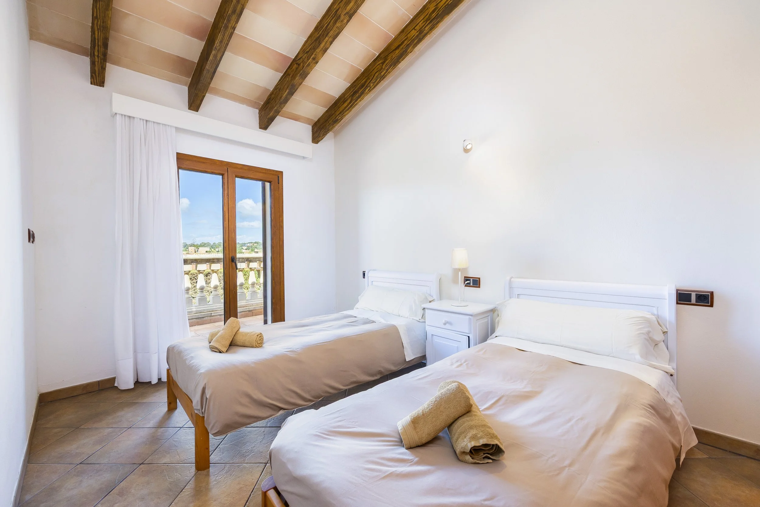 Rural house interior near Ses Salines Mallorca with natural light and traditional Mediterranean design real estate photography