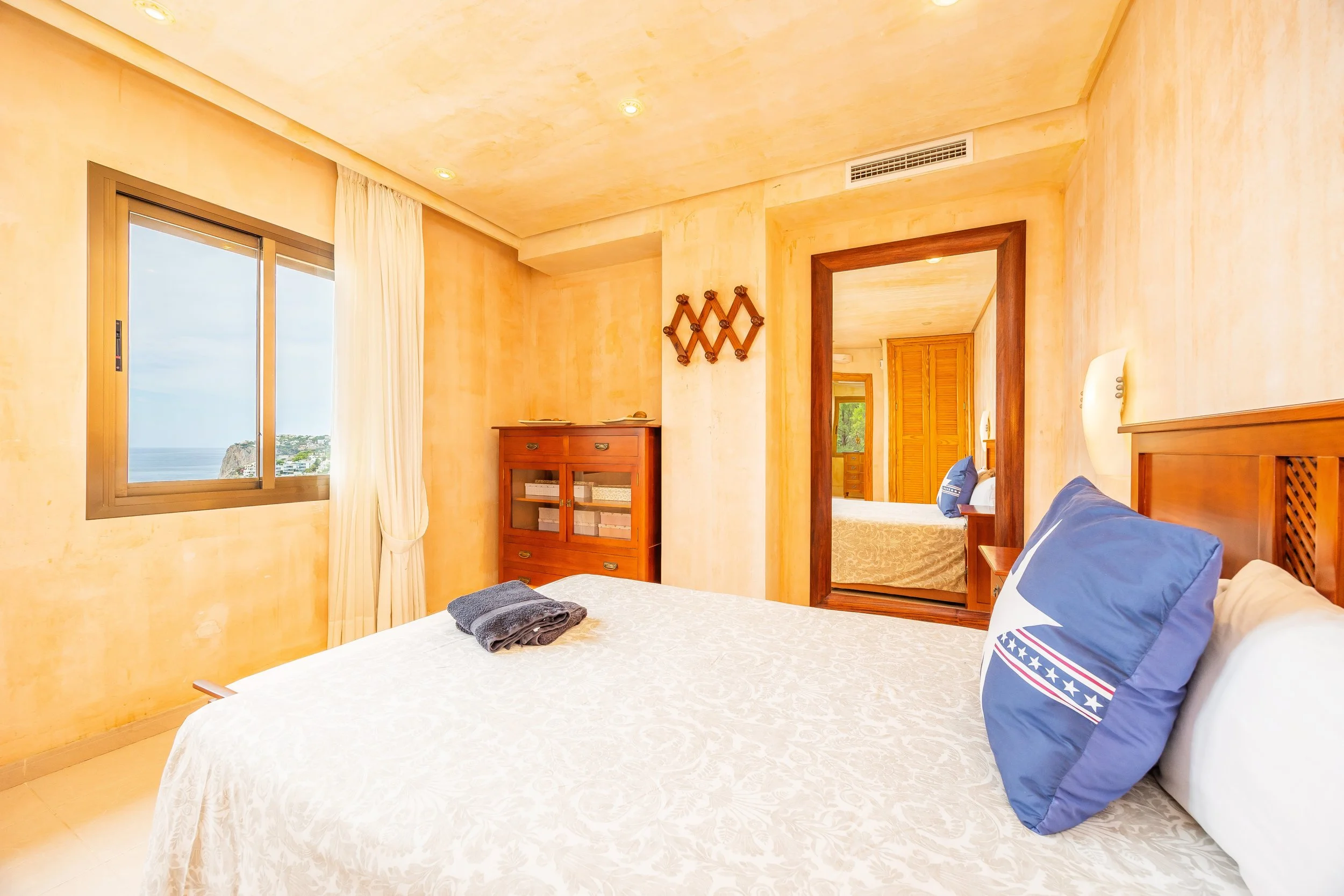 Luxury interior of Villa Cala Llamp Mallorca with modern design, natural light and sea views real estate photography