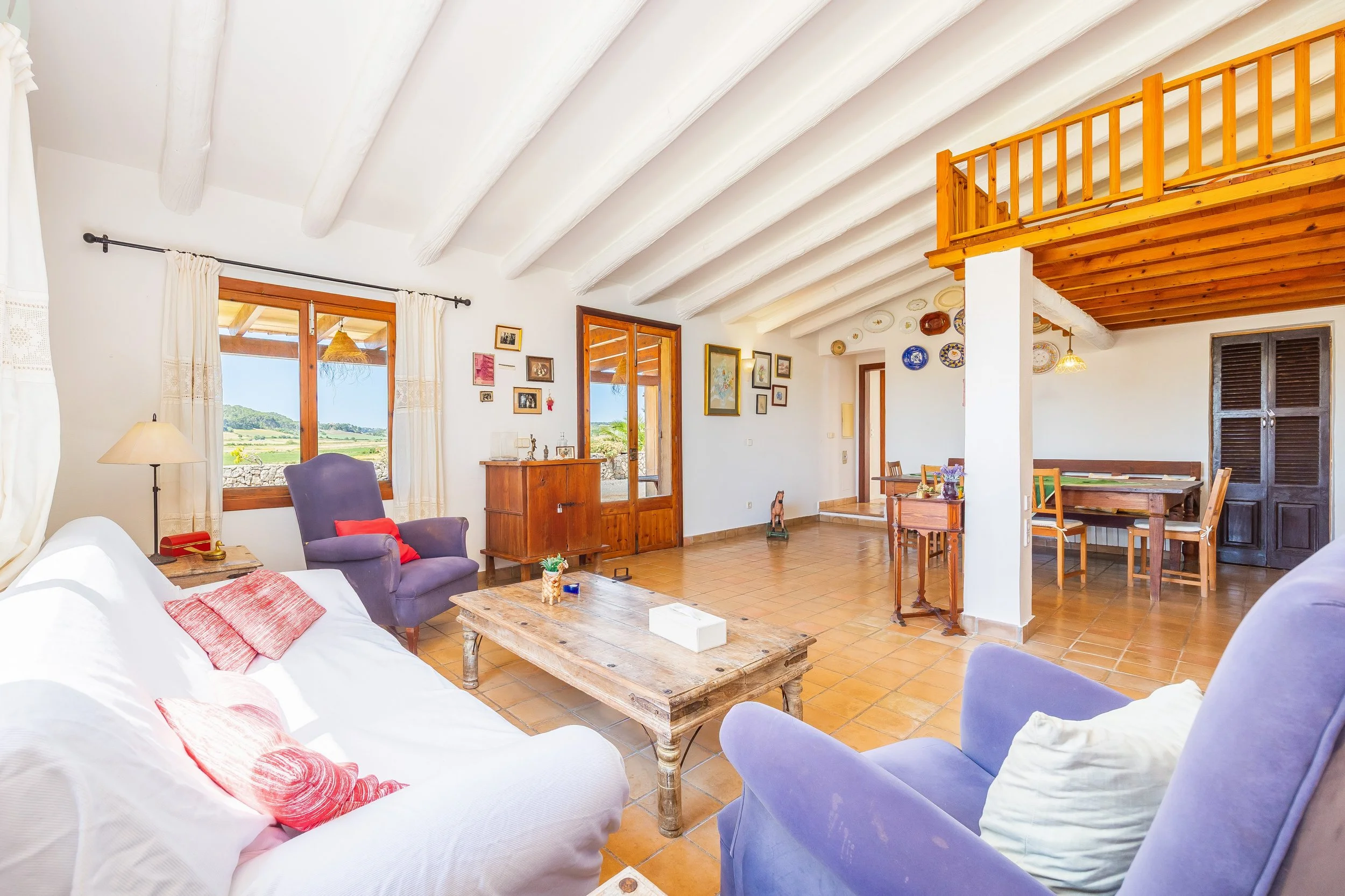 Rural house interior with natural light and traditional Mediterranean style real estate photography in Mallorca
