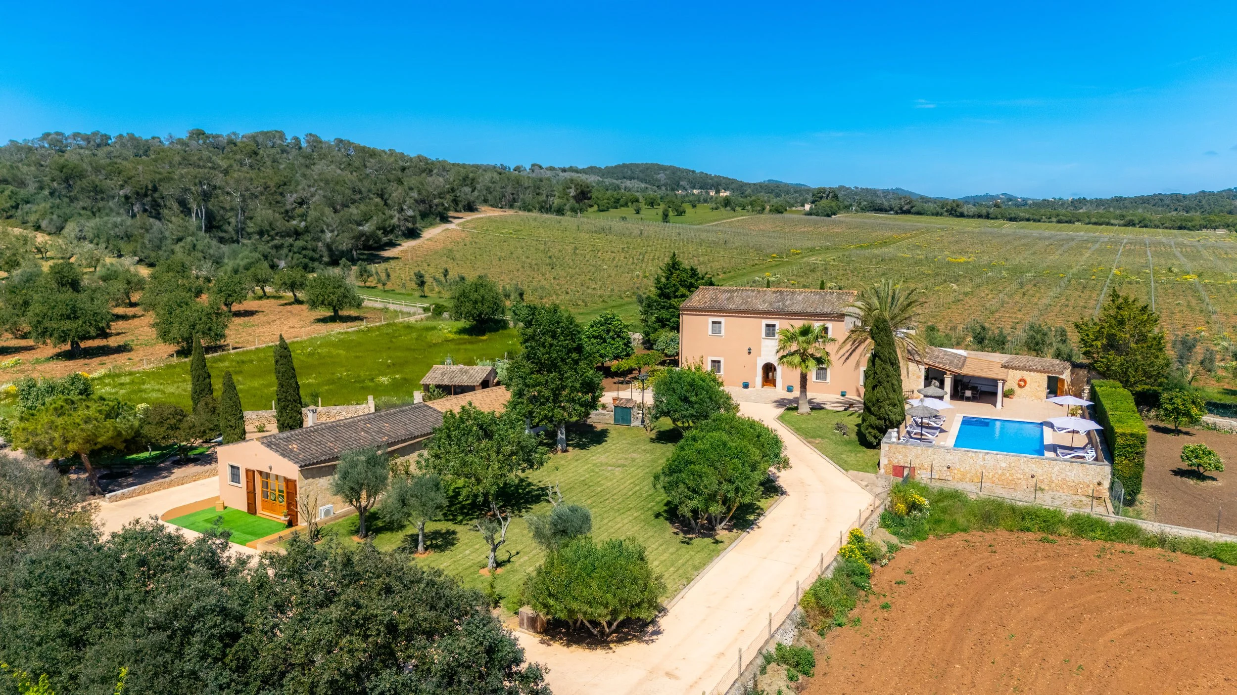 Aerial drone photography of Cas Cuni Mallorca traditional property surrounded by countryside landscape