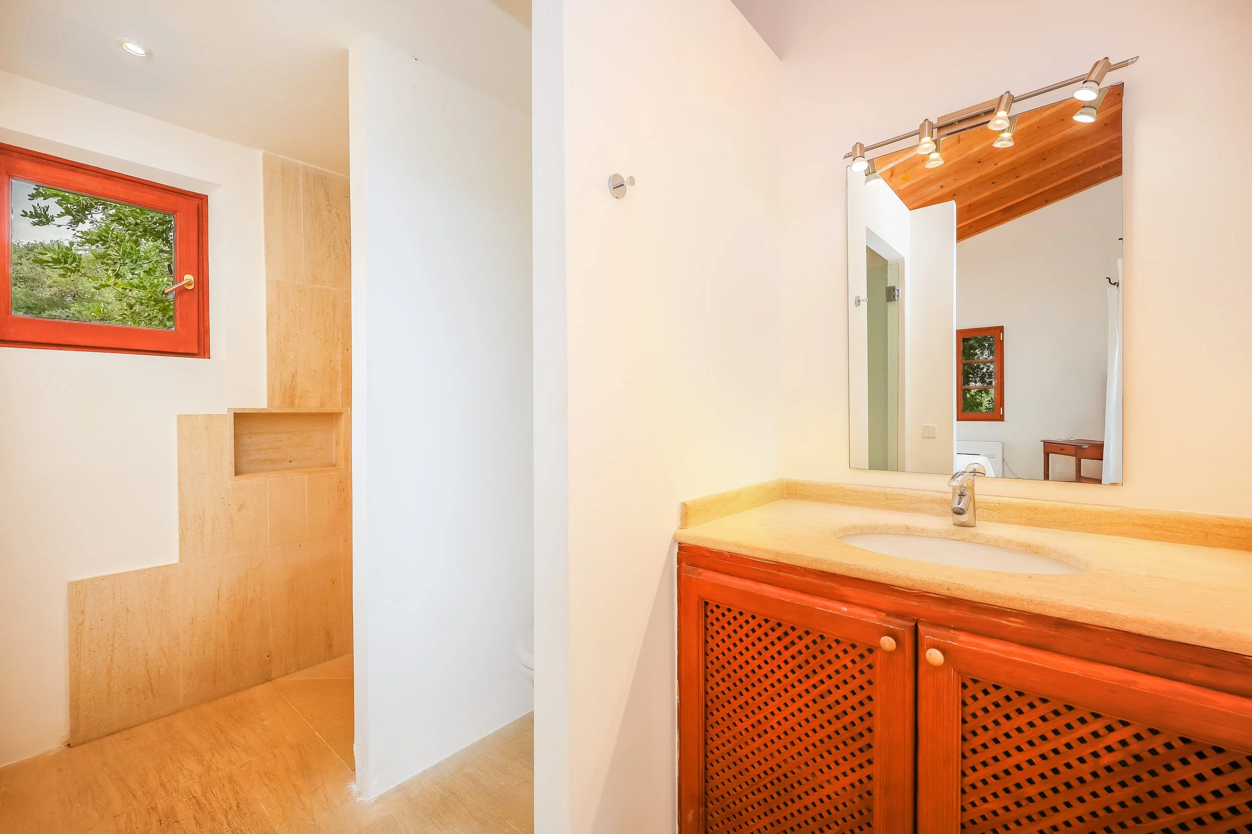 Traditional finca interior near Sant Llorenç Mallorca with rustic architecture and natural light real estate photography