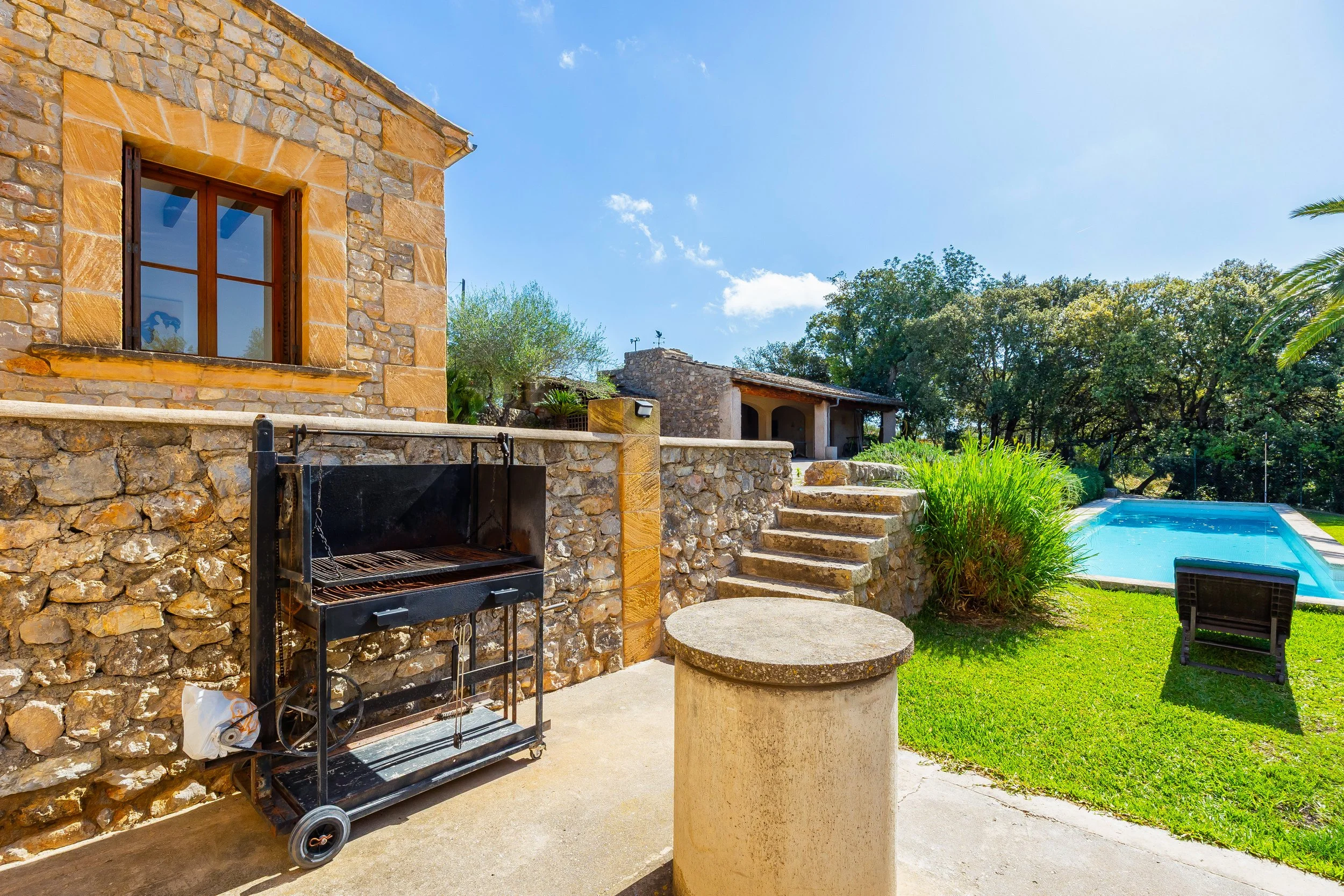 Traditional Mallorcan house with swimming pool near Artà surrounded by countryside real estate photography