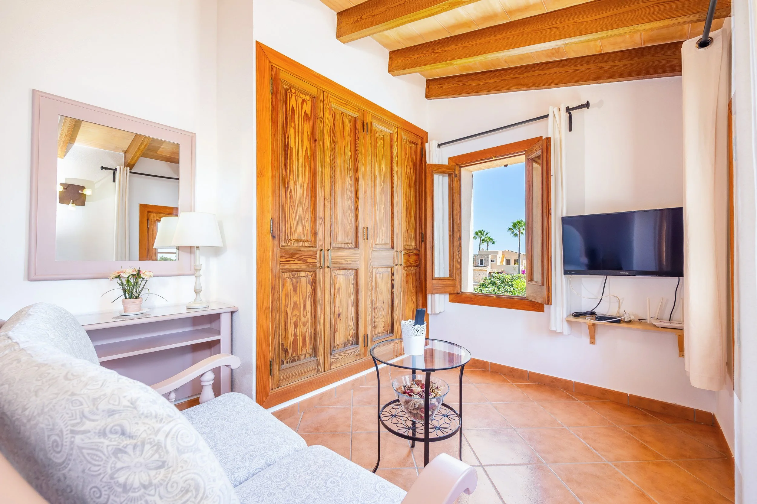 Traditional Mallorcan interior at Can Churi with rustic details and natural light real estate photography