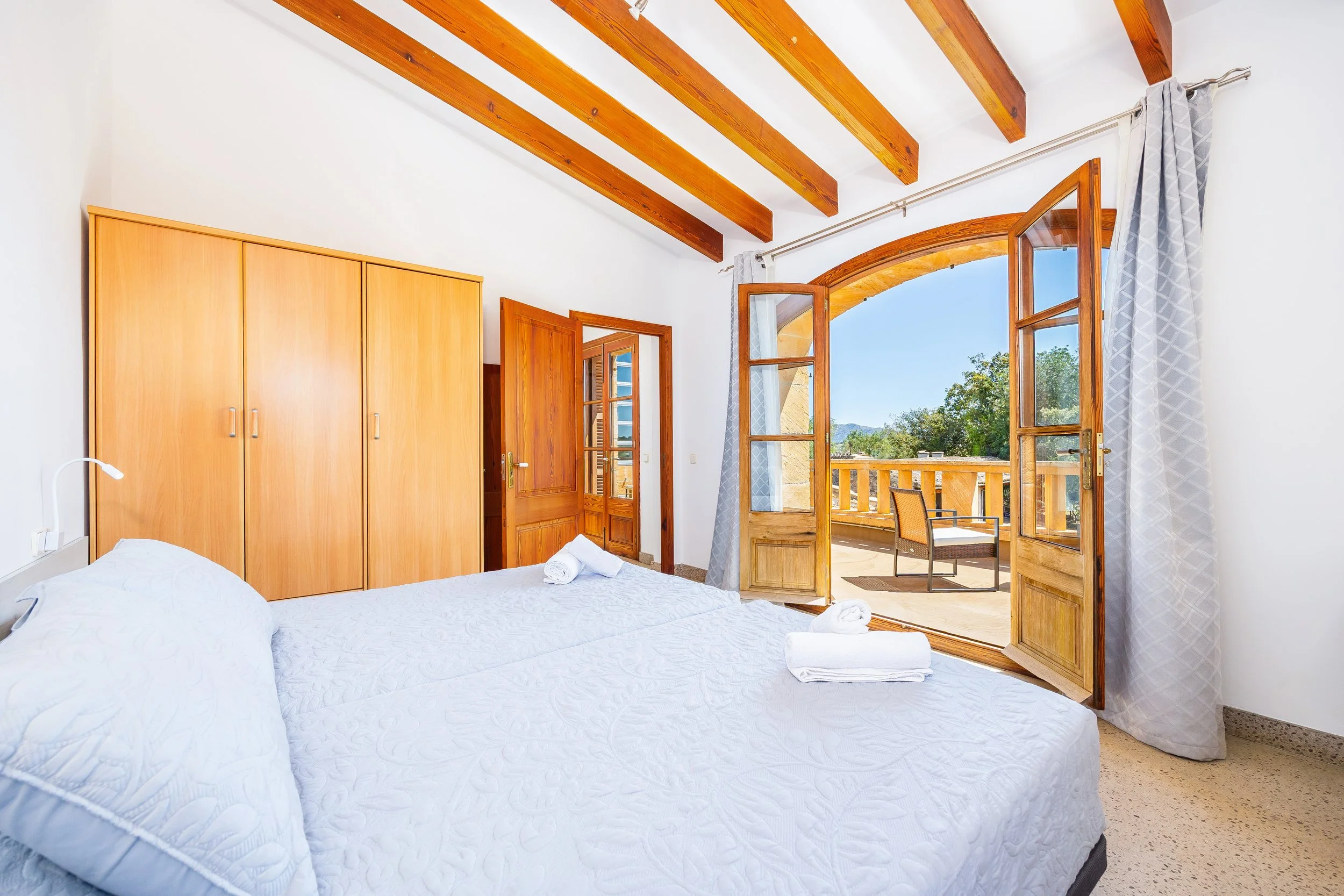Mallorcan house interior near Artà with rustic architecture and natural light real estate photography