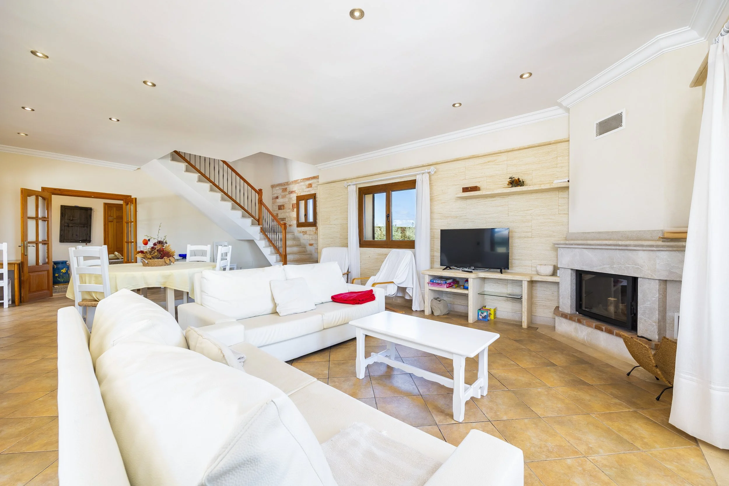 Rural house interior near Ses Salines Mallorca with natural light and traditional Mediterranean design real estate photography