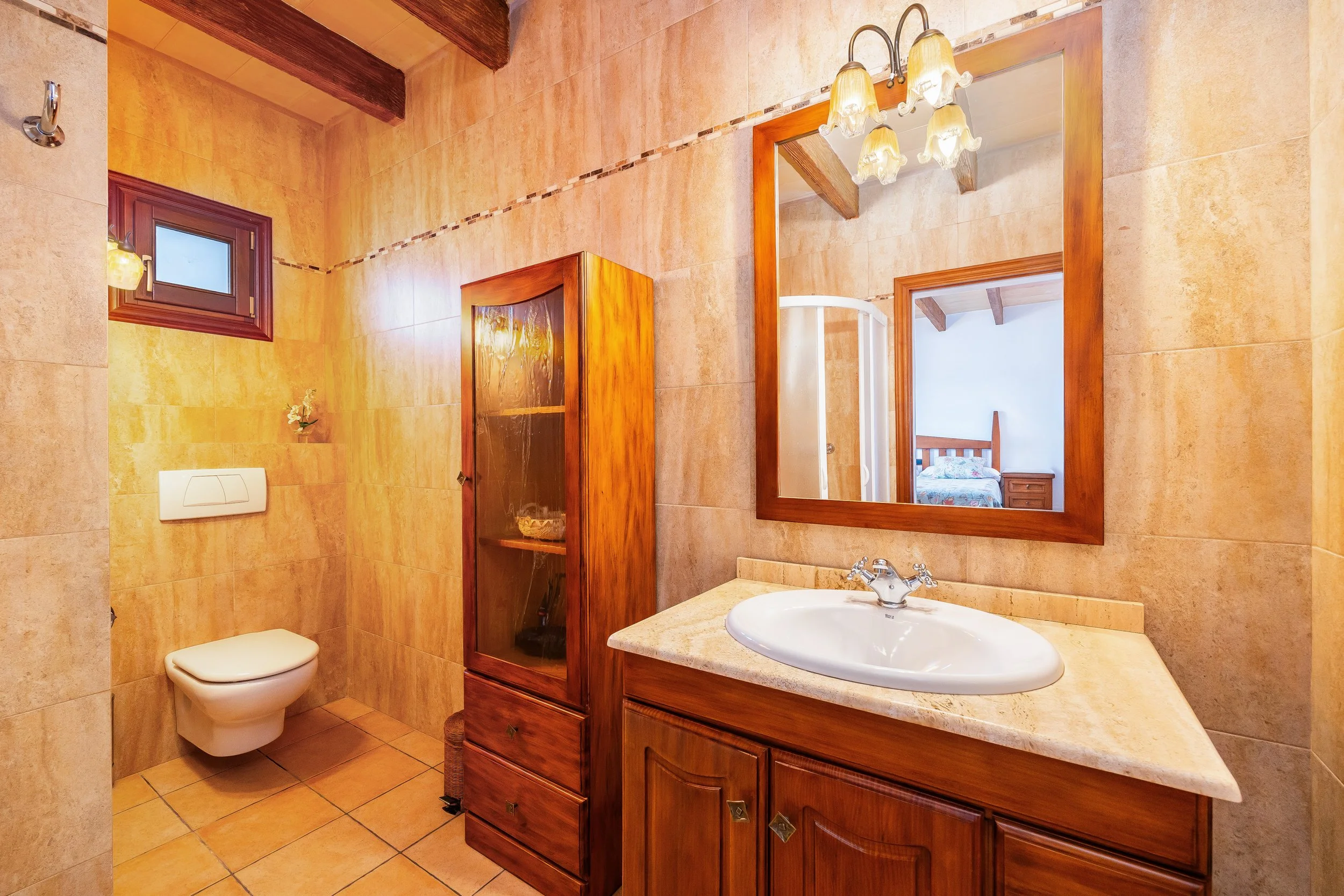 Traditional interior of Cas Cuni Mallorca with rustic architecture and natural light real estate photography