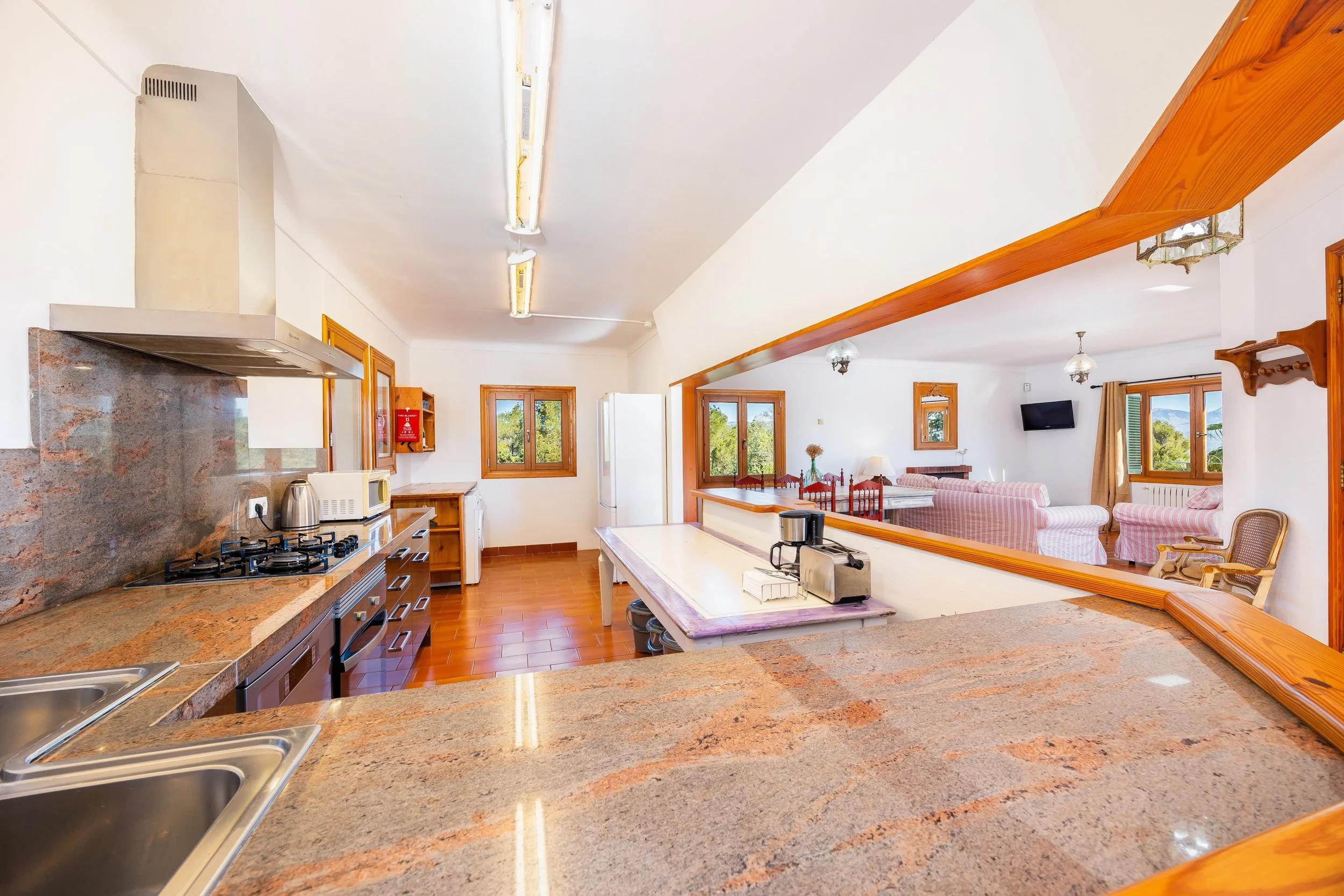 Traditional Mallorcan finca interior photography with natural light and rustic details