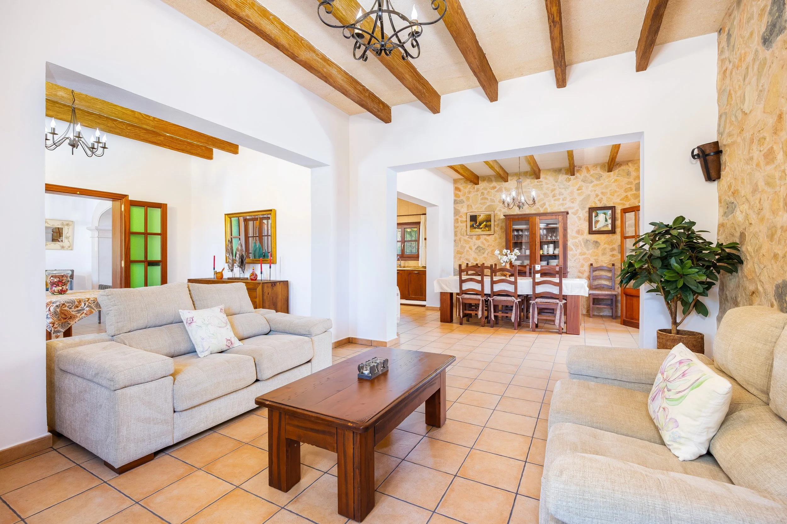 Traditional interior of Cas Cuni Mallorca with rustic architecture and natural light real estate photography