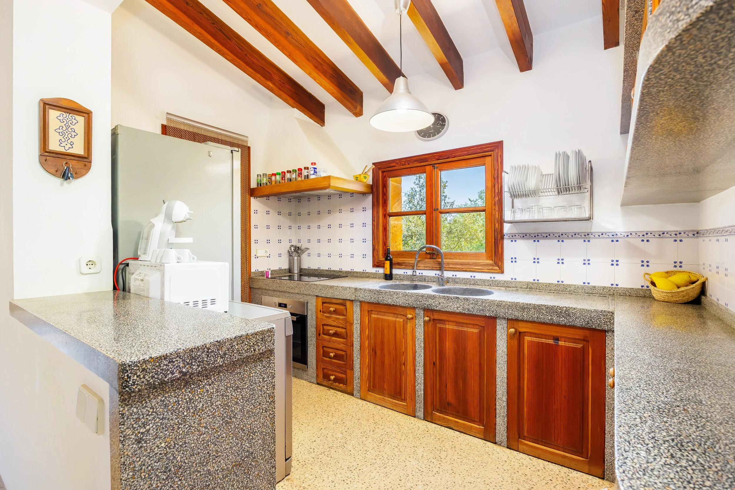 Mallorcan house interior near Artà with rustic architecture and natural light real estate photography