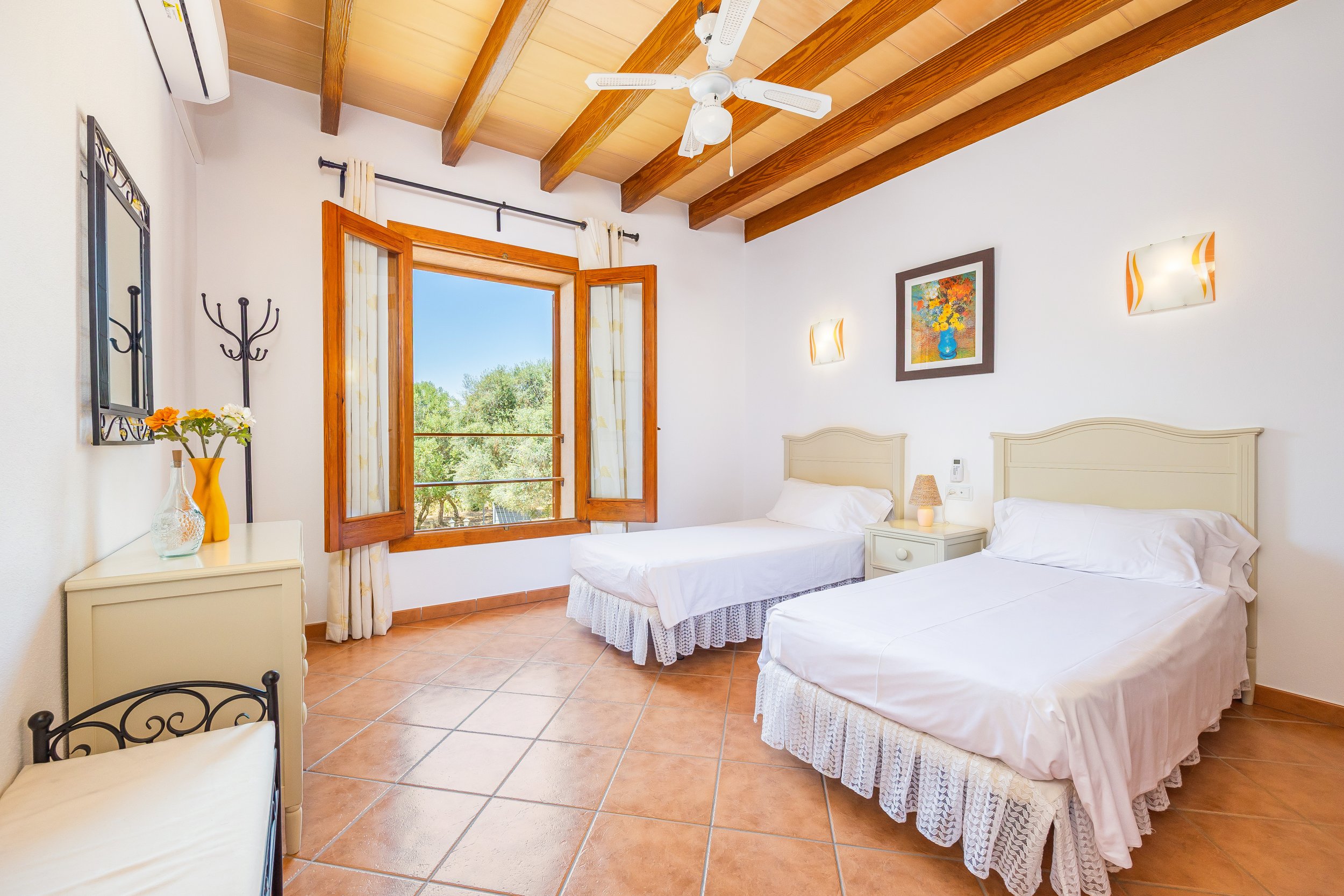 Traditional Mallorcan interior at Can Churi with rustic details and natural light real estate photography