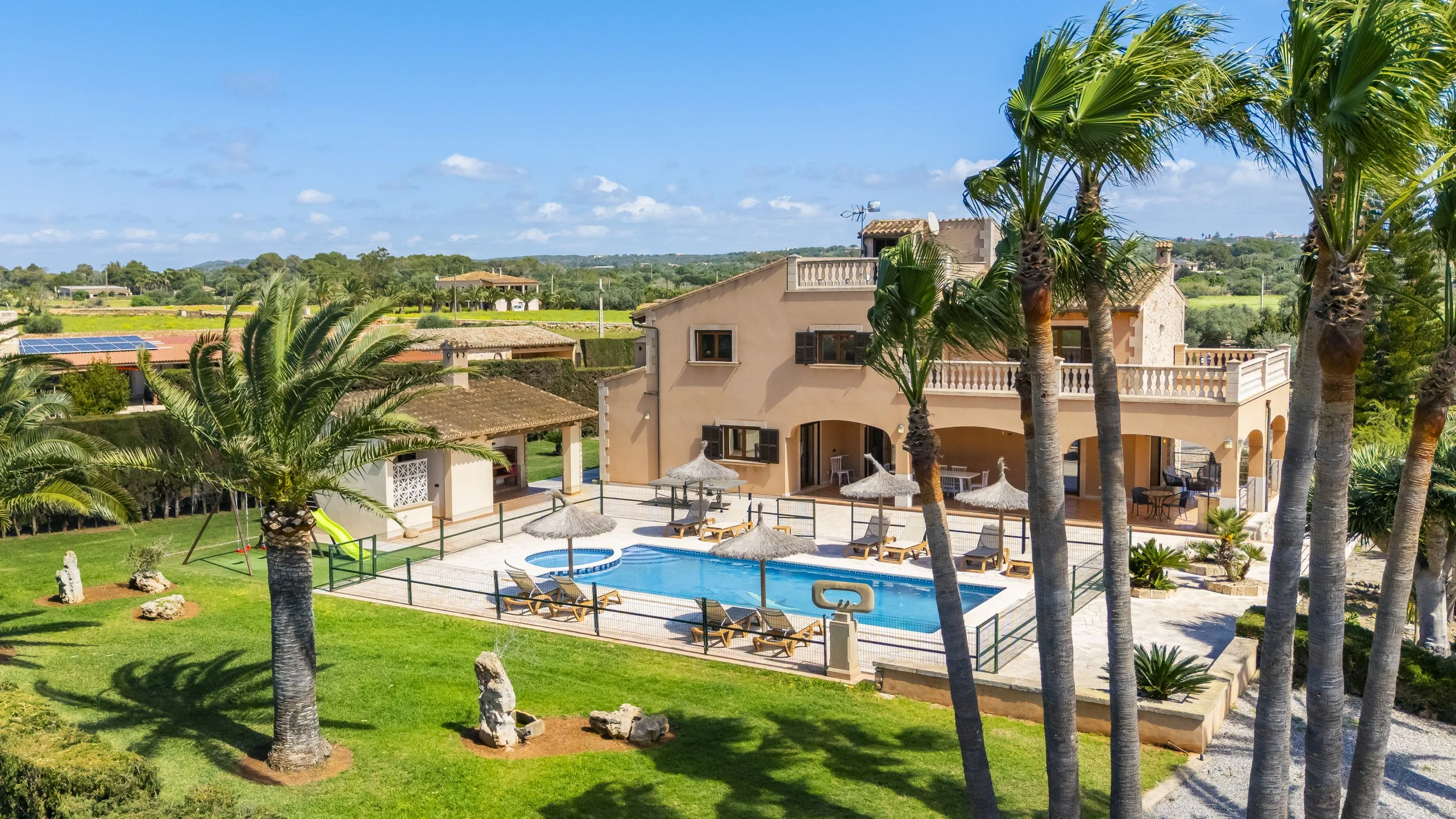 Aerial drone photography of rural house near Ses Salines Mallorca with private pool and garden