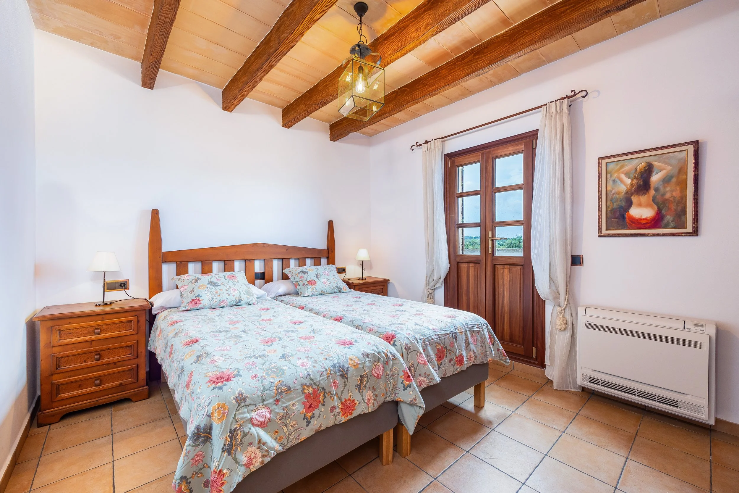 Traditional interior of Cas Cuni Mallorca with rustic architecture and natural light real estate photography