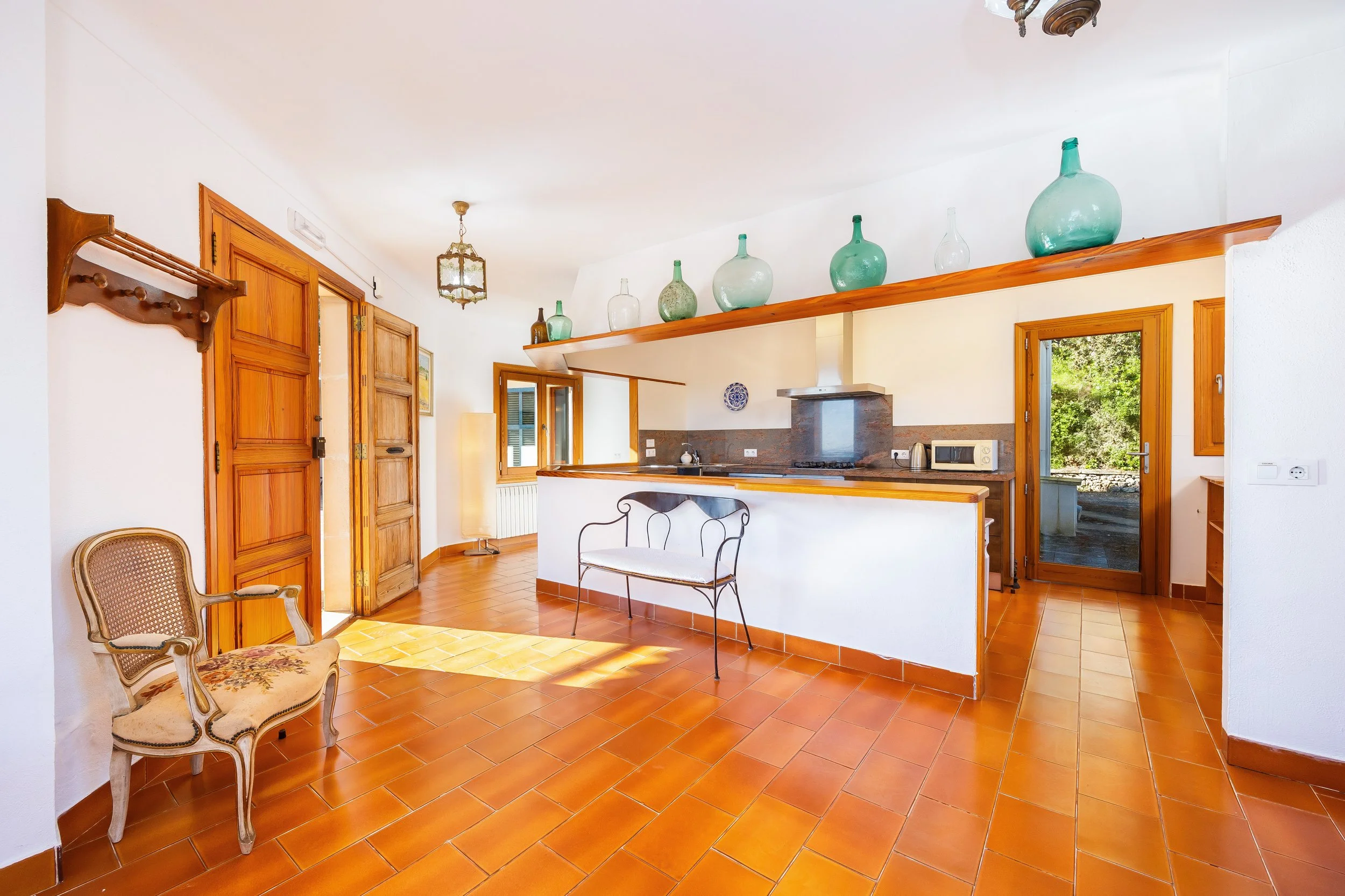Traditional Mallorcan finca interior photography with natural light and rustic details