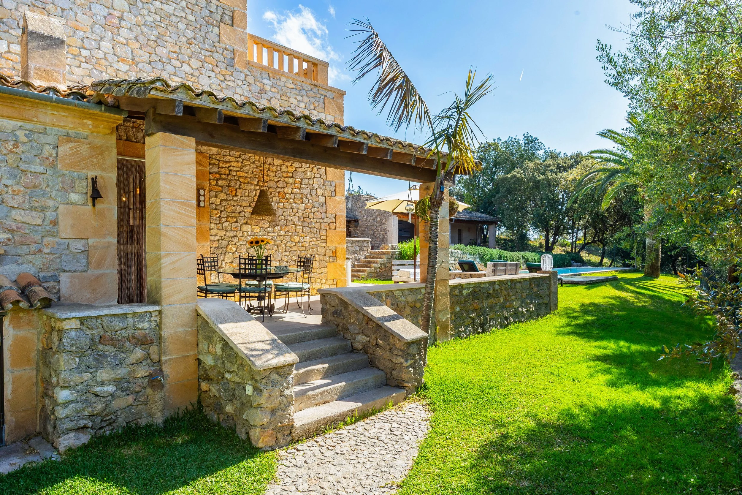 Traditional Mallorcan house with swimming pool near Artà surrounded by countryside real estate photography