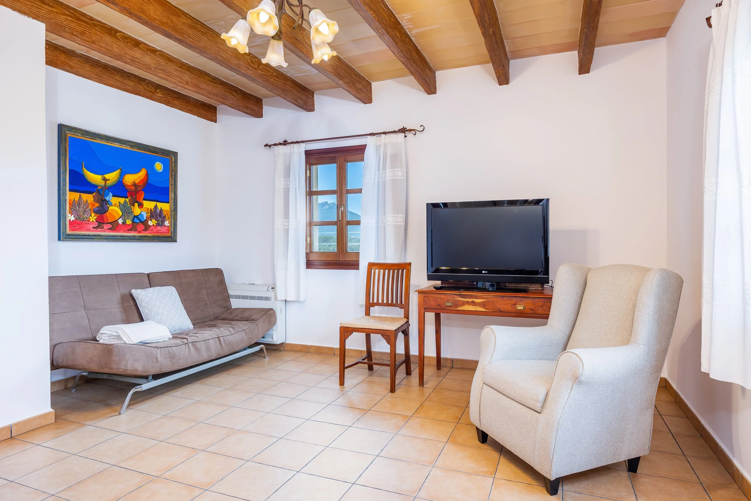 Traditional interior of Cas Cuni Mallorca with rustic architecture and natural light real estate photography