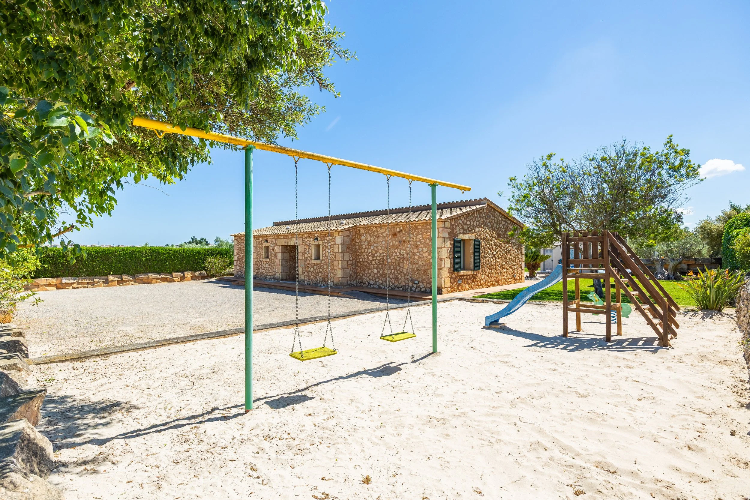 Sa Finca Mallorca finca exterior with pool, garden and family leisure area real estate photography