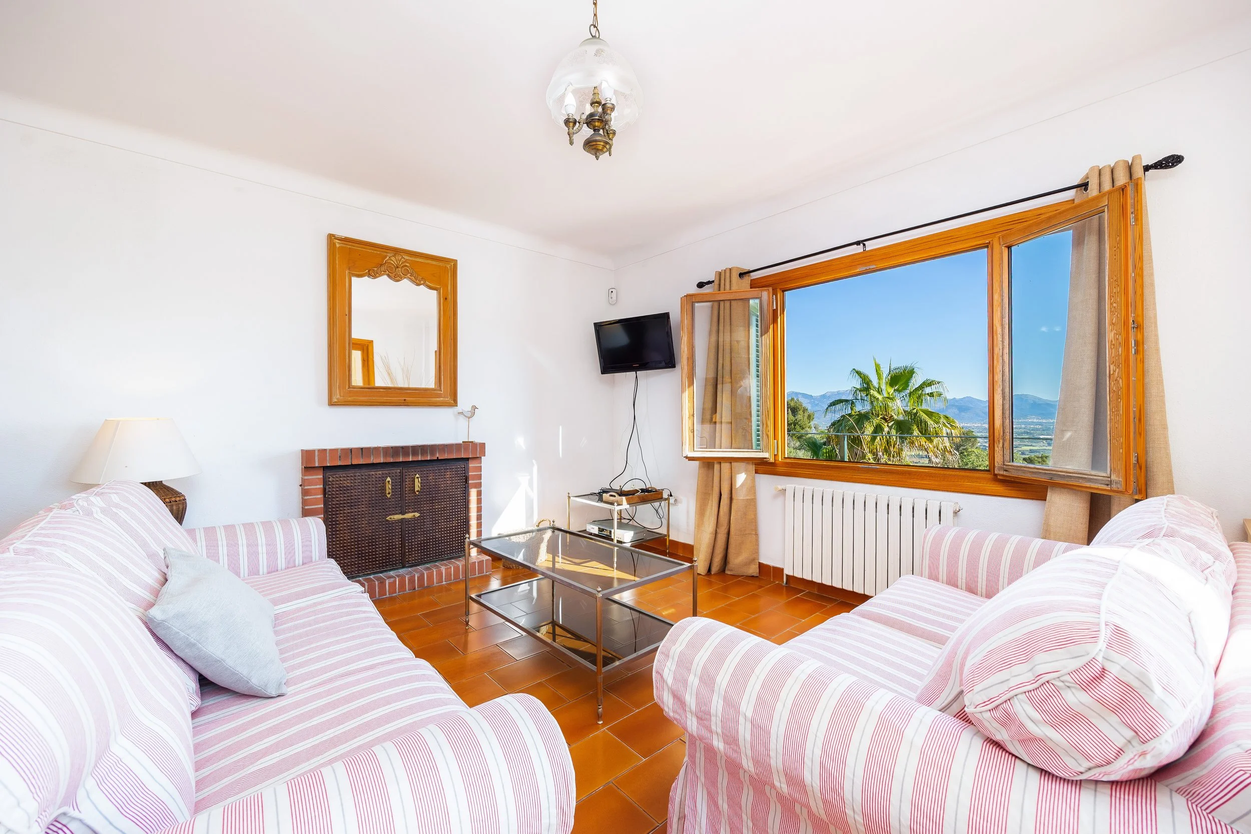 Traditional Mallorcan finca interior photography with natural light and rustic details