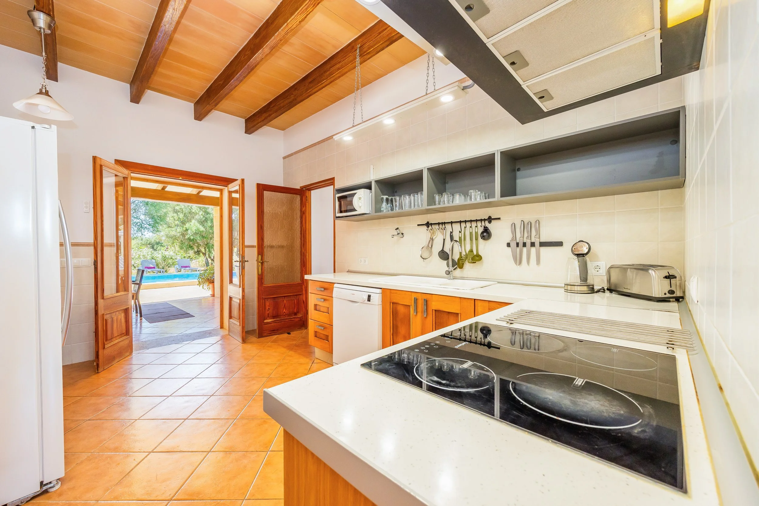 Traditional Mallorcan interior at Can Churi with rustic details and natural light real estate photography