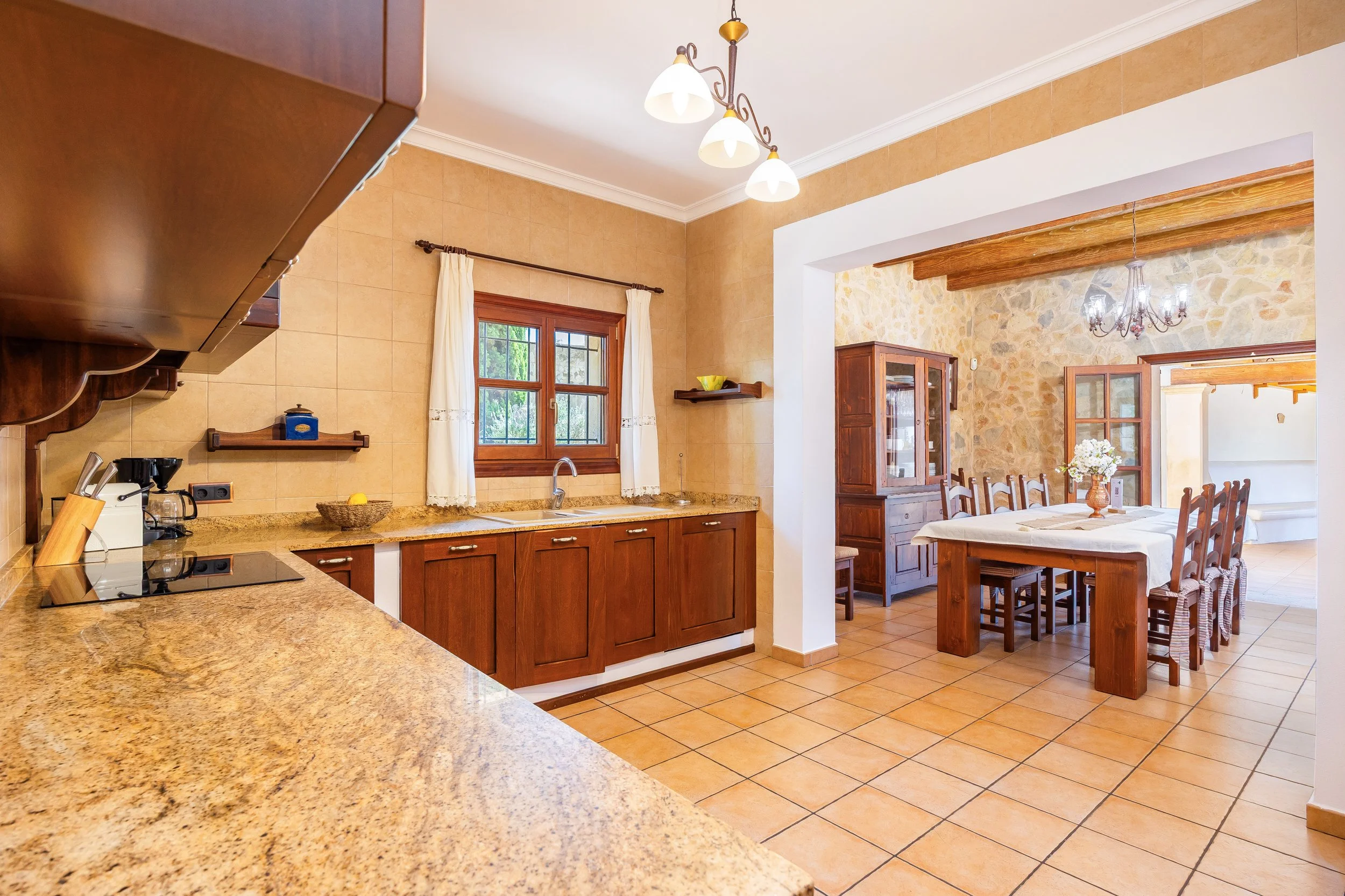 Traditional interior of Cas Cuni Mallorca with rustic architecture and natural light real estate photography