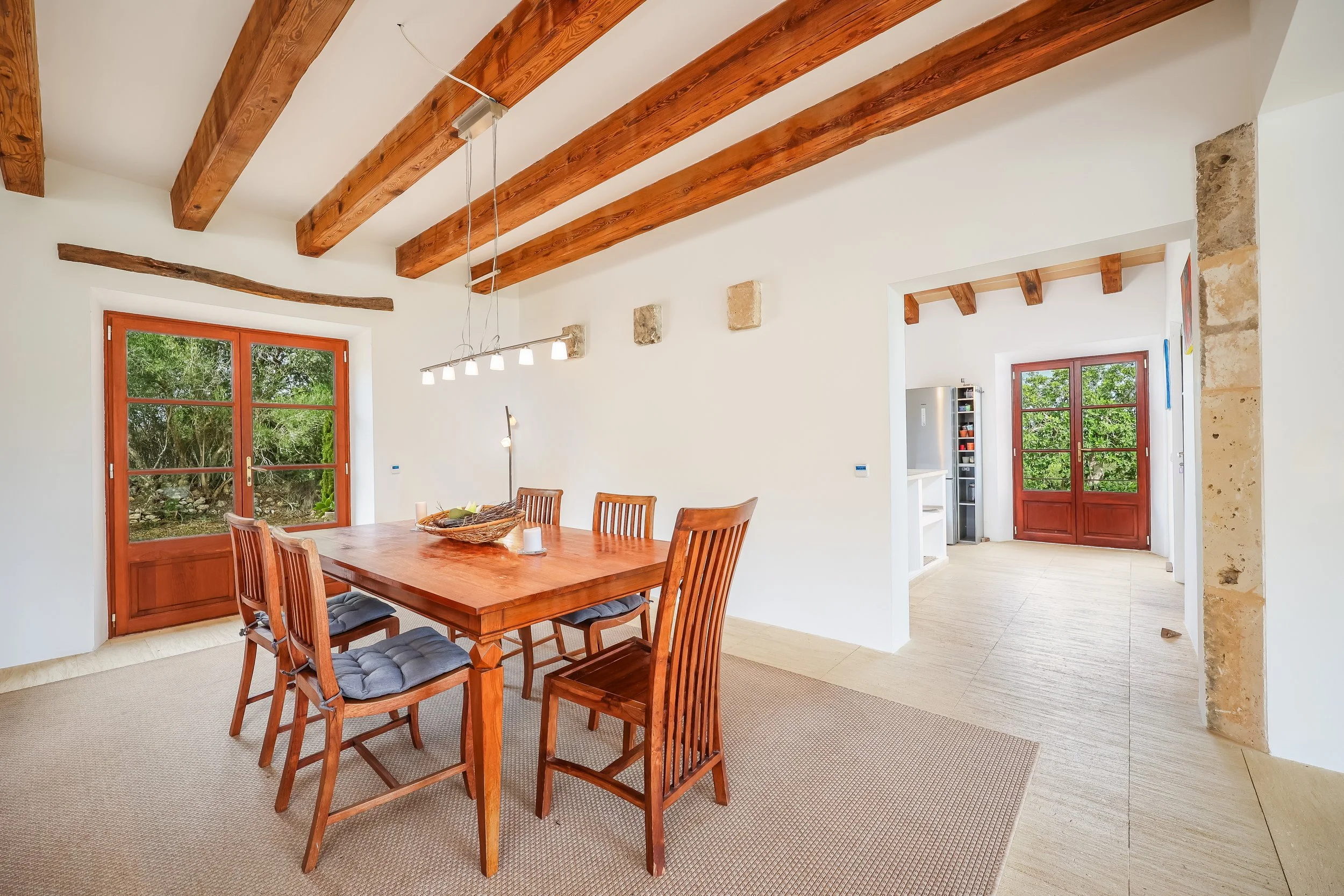 Traditional finca interior near Sant Llorenç Mallorca with rustic architecture and natural light real estate photography