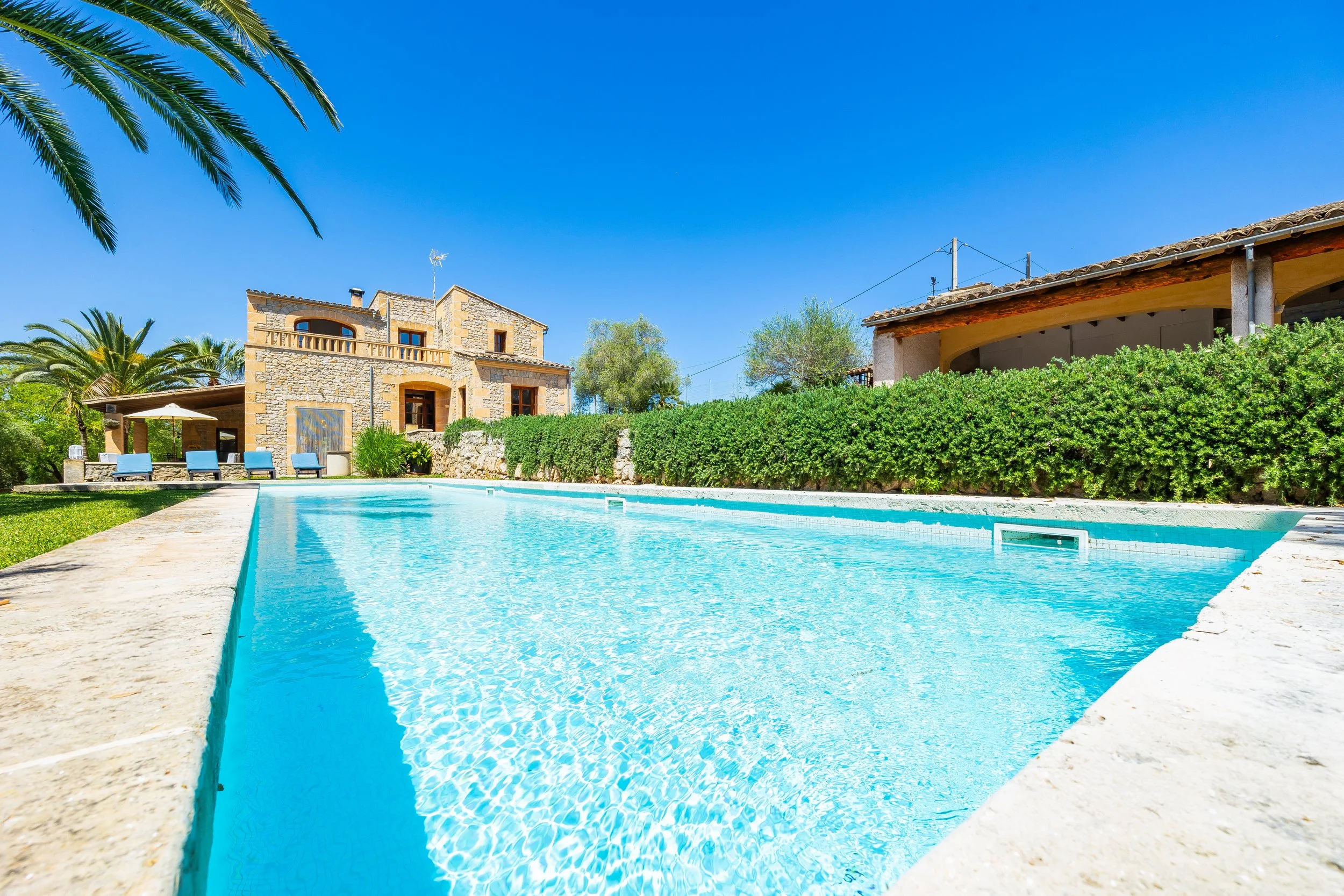Traditional Mallorcan house with swimming pool near Artà surrounded by countryside real estate photography