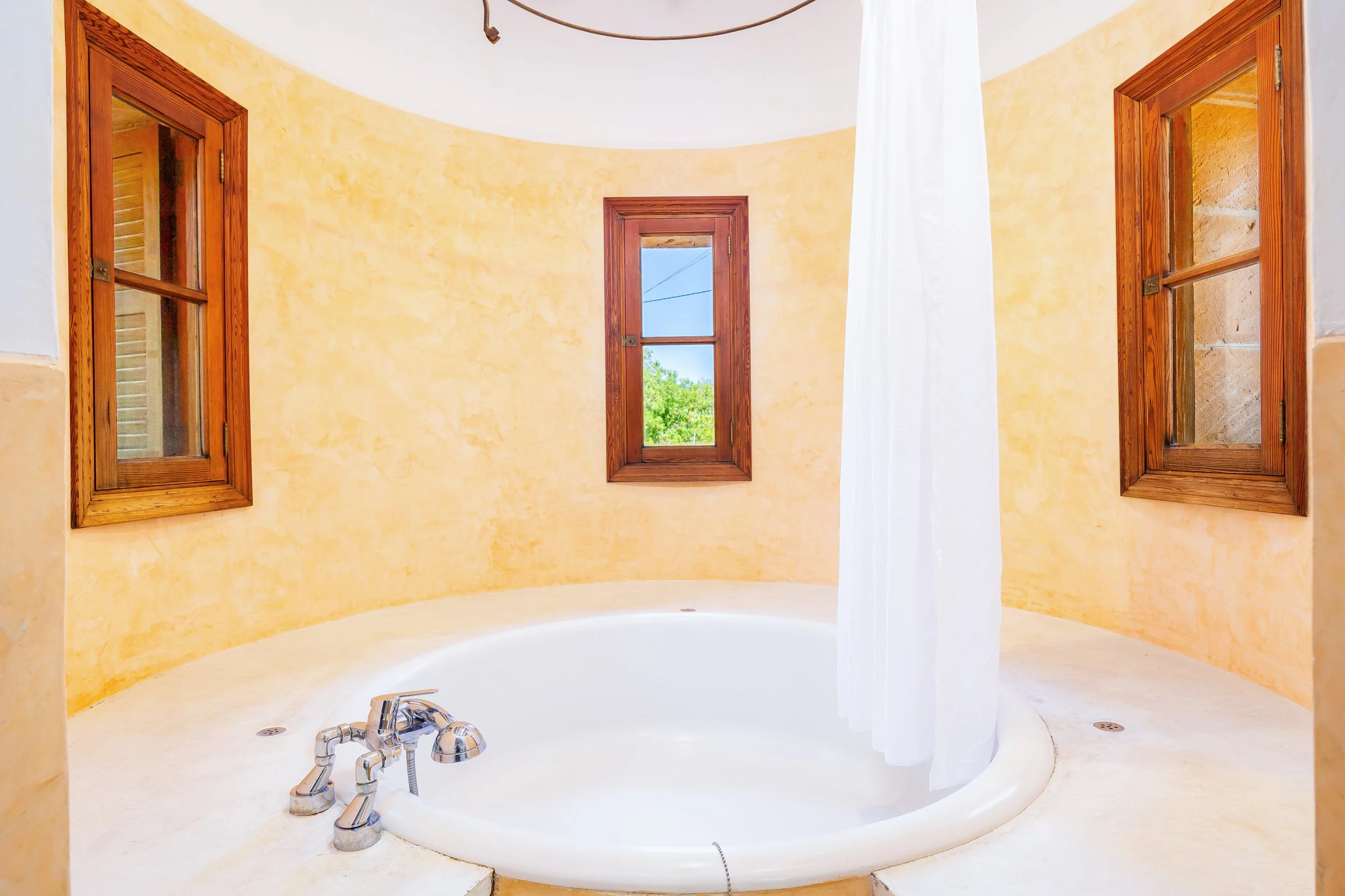 Mallorcan house interior near Artà with rustic architecture and natural light real estate photography