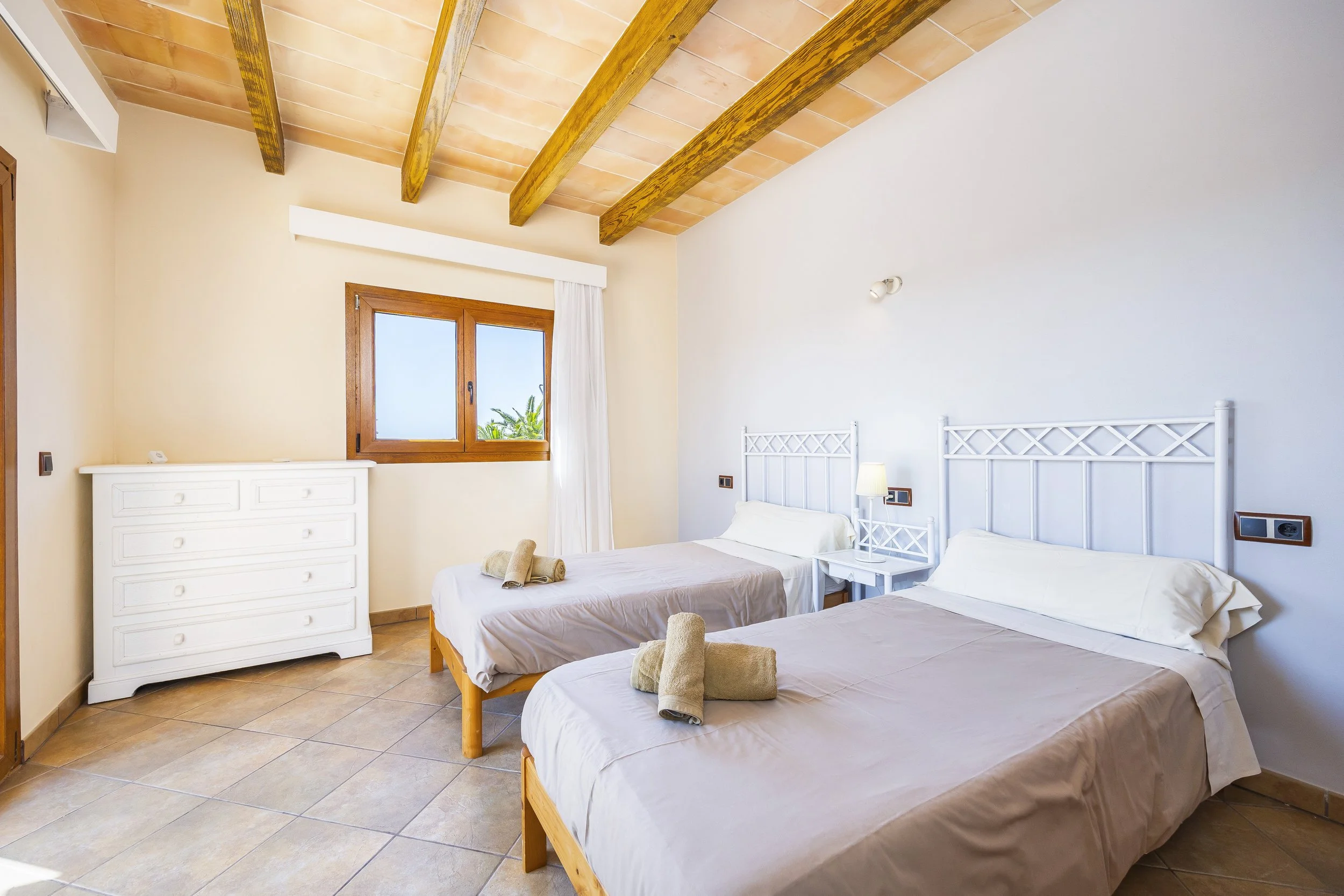 Rural house interior near Ses Salines Mallorca with natural light and traditional Mediterranean design real estate photography