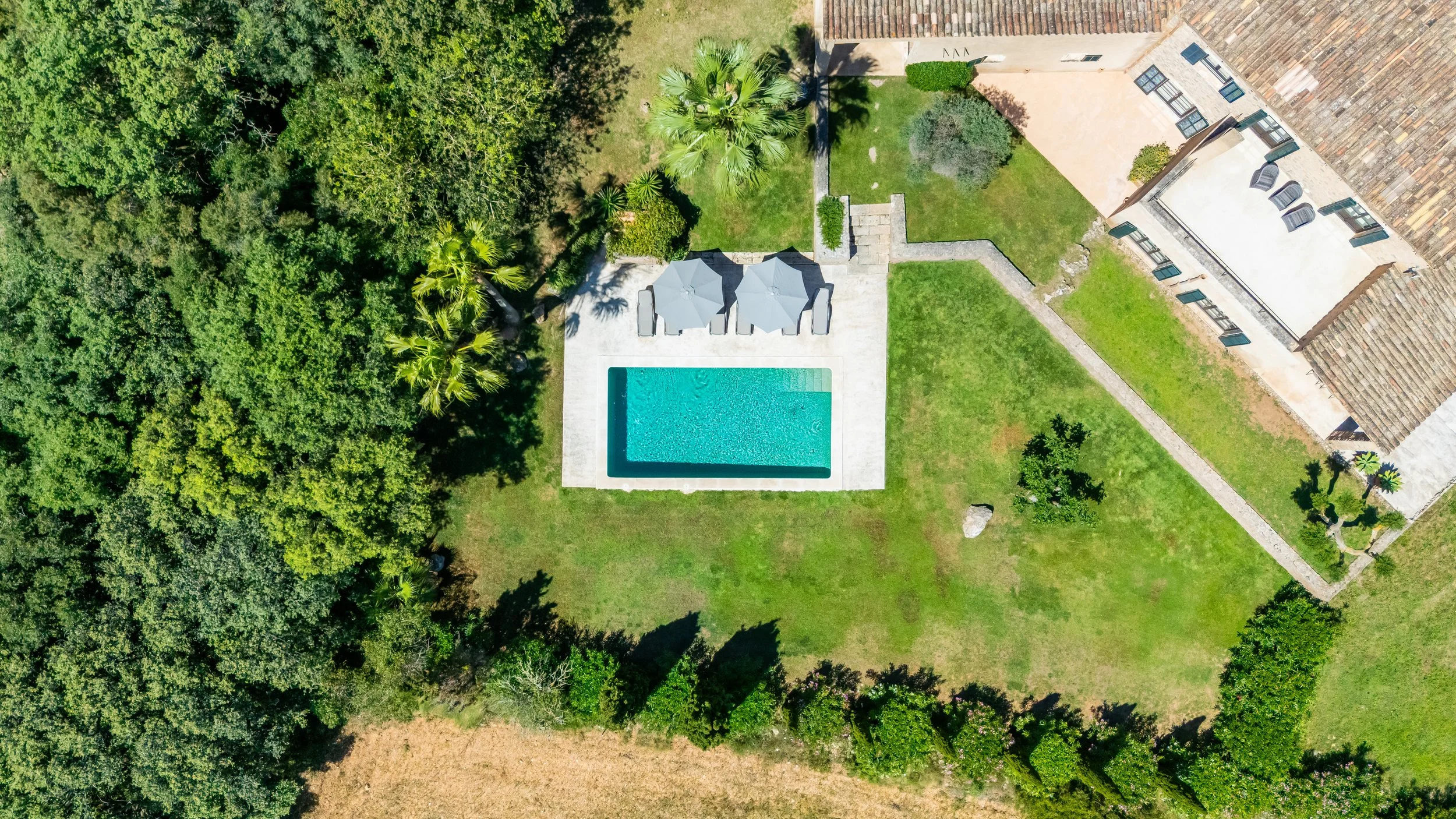 Aerial drone photography of Finca Esteva Mallorca with private pool and countryside near Sant Llorenç