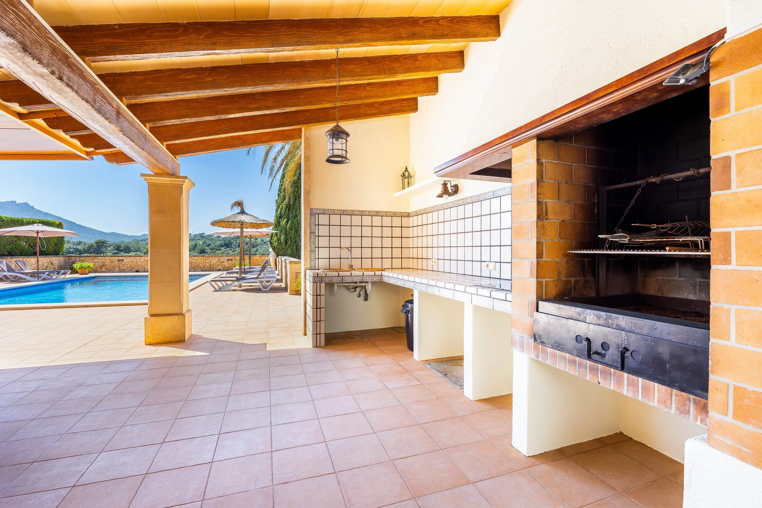 Traditional interior of Cas Cuni Mallorca with rustic architecture and natural light real estate photography