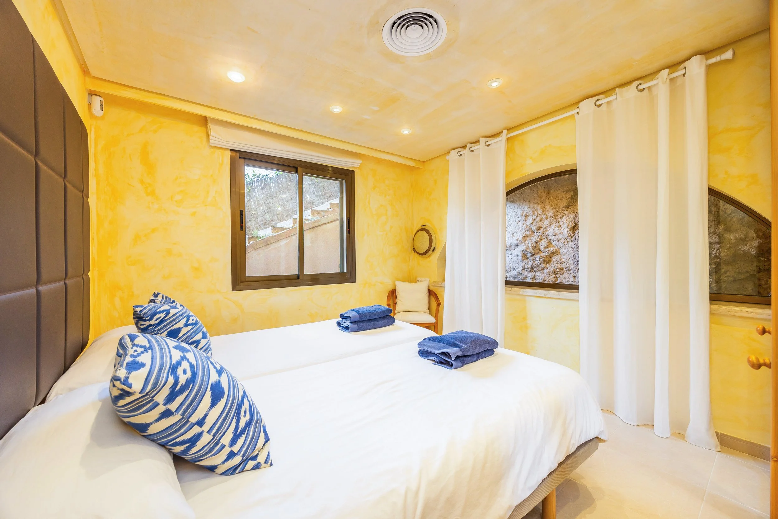 Luxury interior of Villa Cala Llamp Mallorca with modern design, natural light and sea views real estate photography