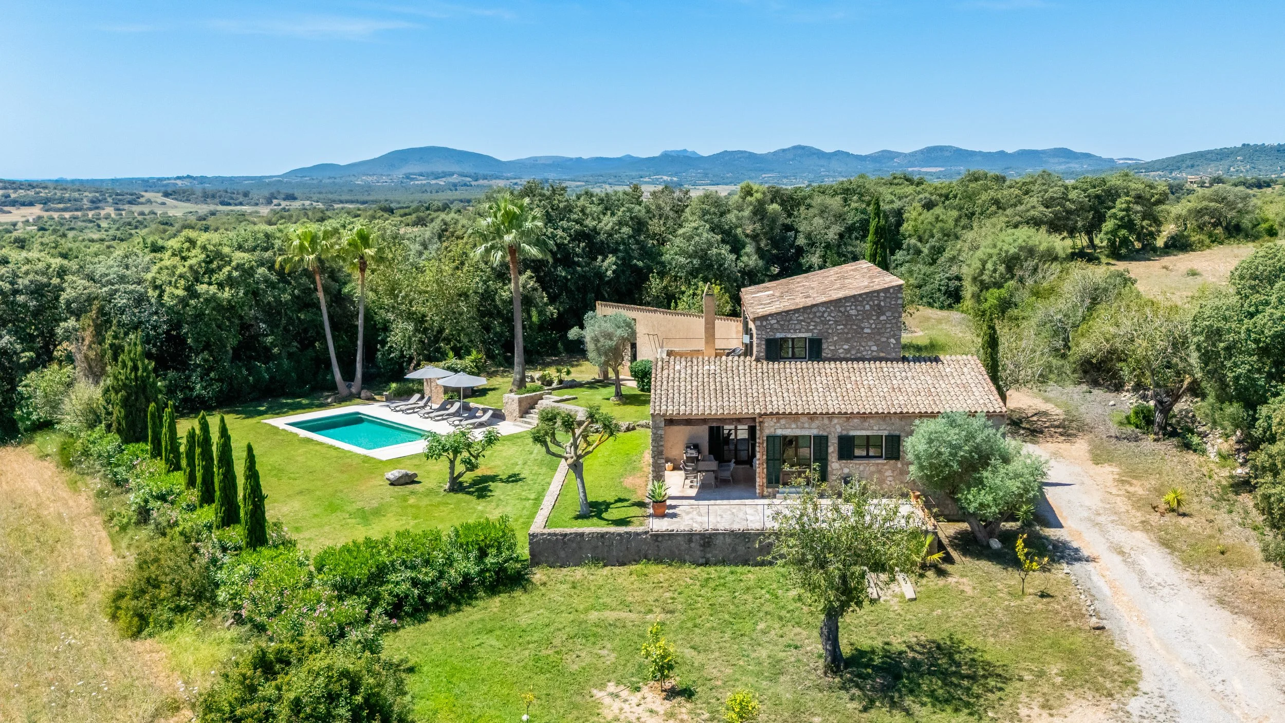 Aerial drone photography of Finca Esteva Mallorca with private pool and countryside near Sant Llorenç