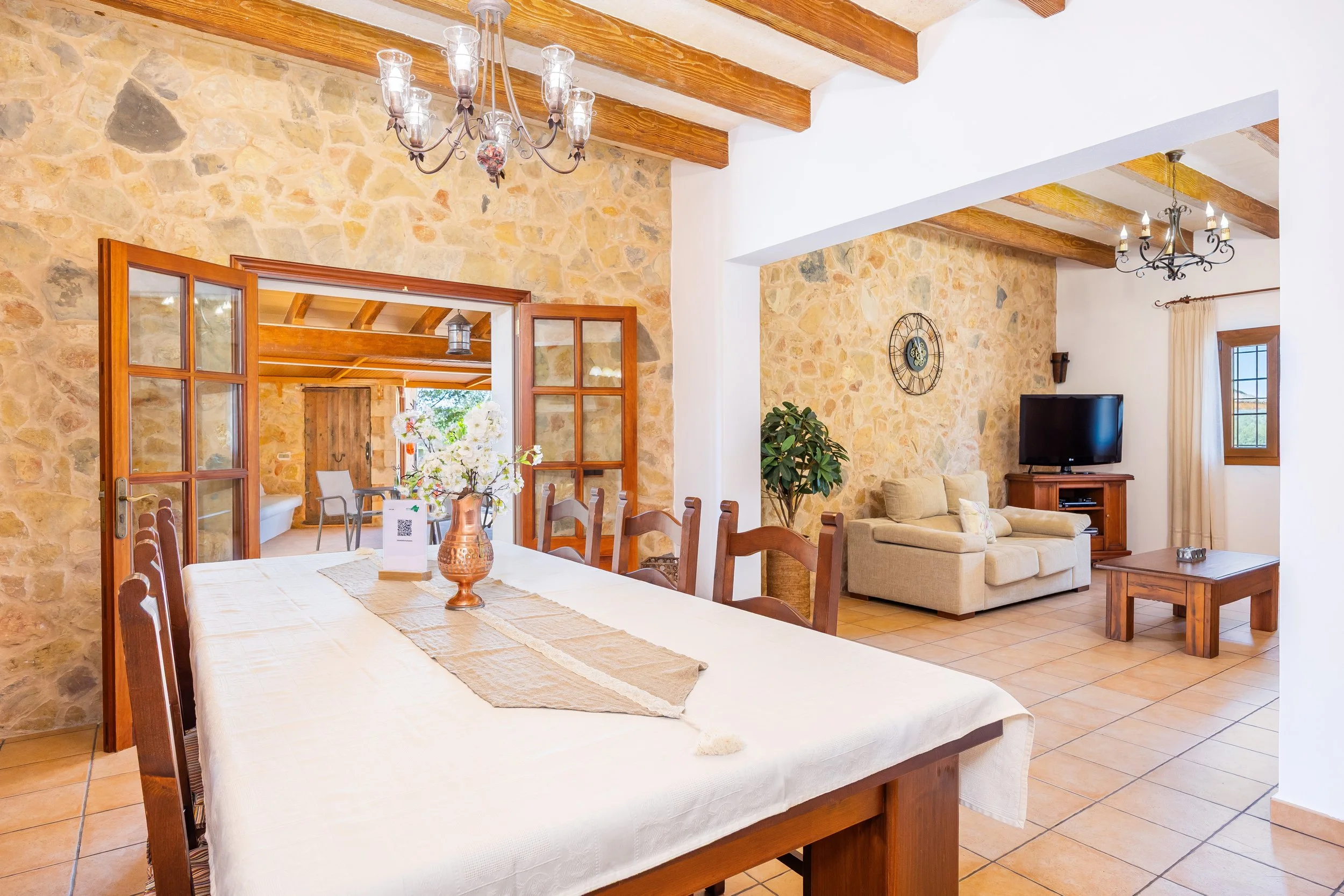 Traditional interior of Cas Cuni Mallorca with rustic architecture and natural light real estate photography