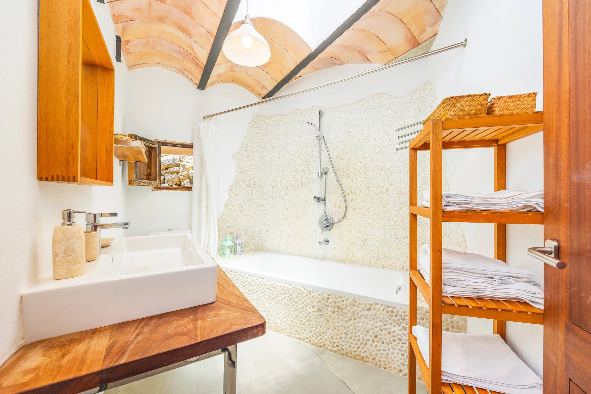 Mountain house interior near Sóller Mallorca renovated with natural light and modern rustic style real estate photography