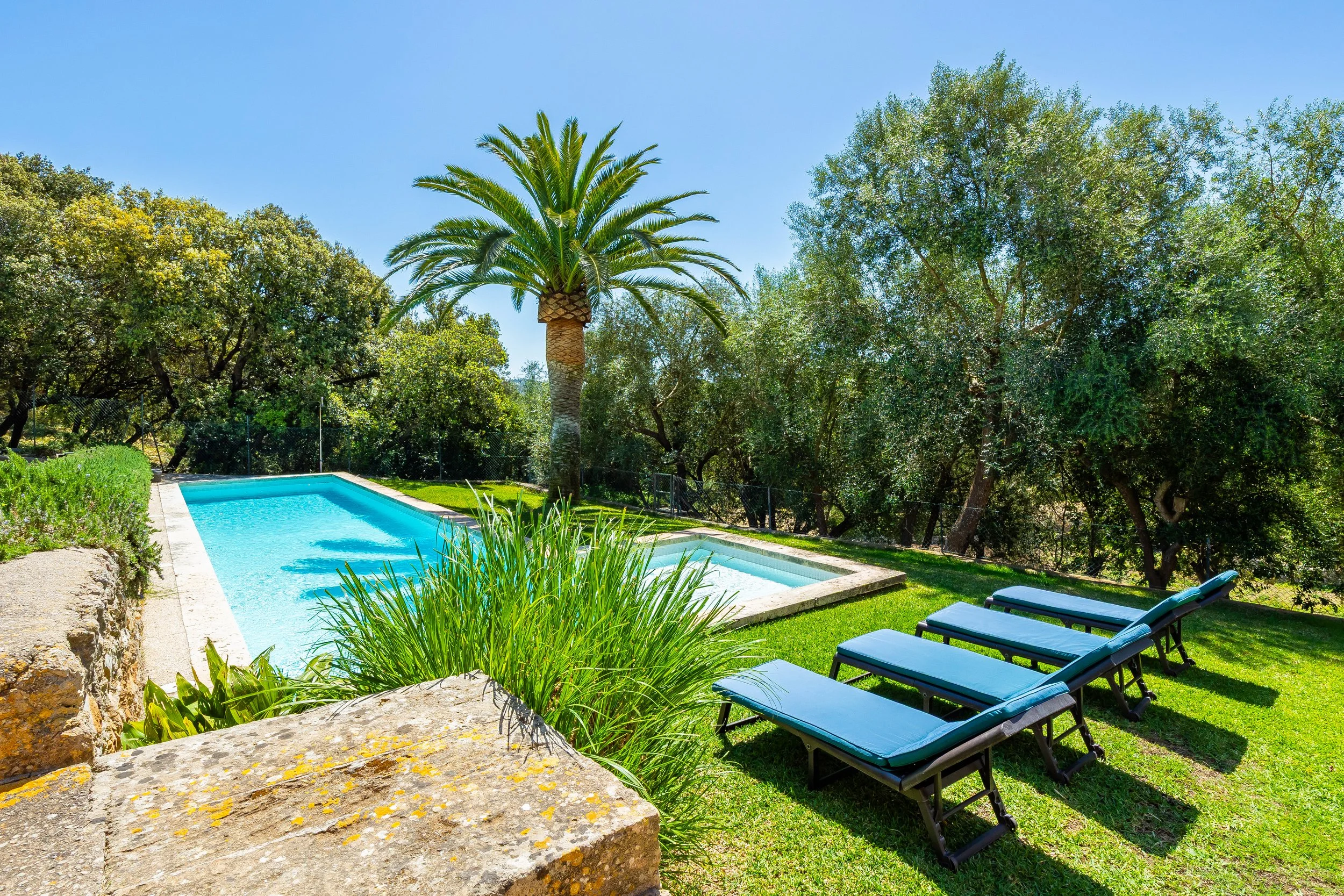 Traditional Mallorcan house with swimming pool near Artà surrounded by countryside real estate photography