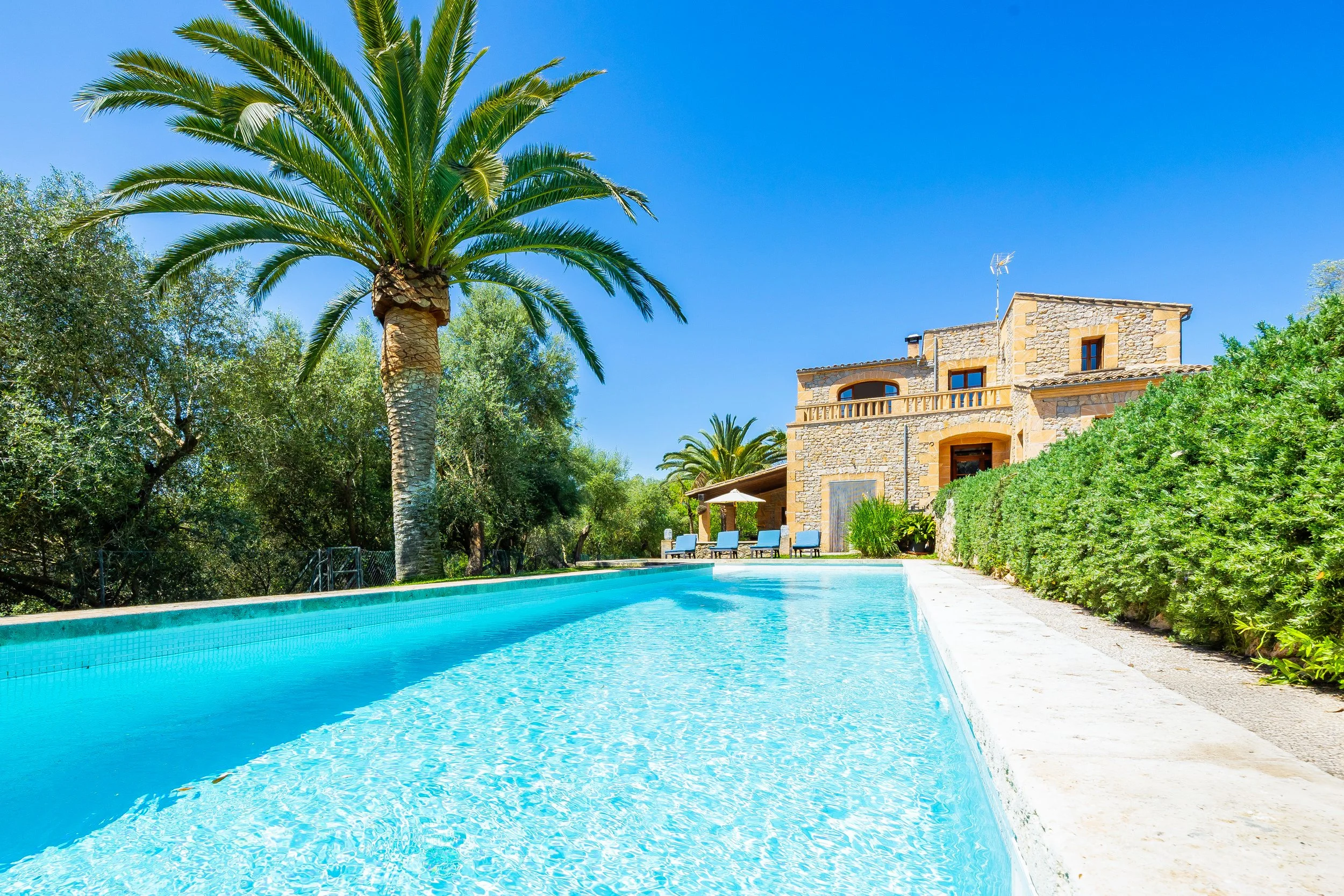 Traditional Mallorcan house with swimming pool near Artà surrounded by countryside real estate photography