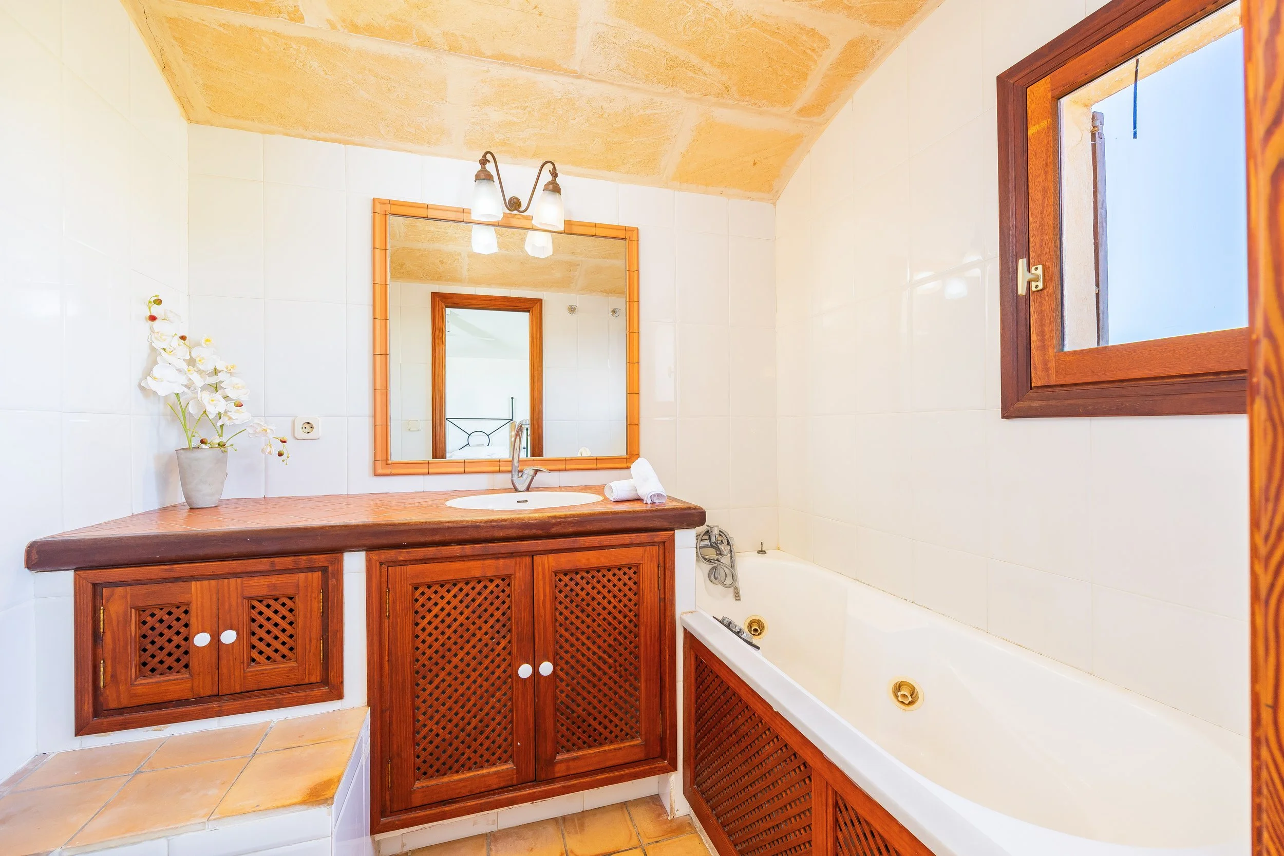 Rural house interior with natural light and traditional Mediterranean style real estate photography in Mallorca