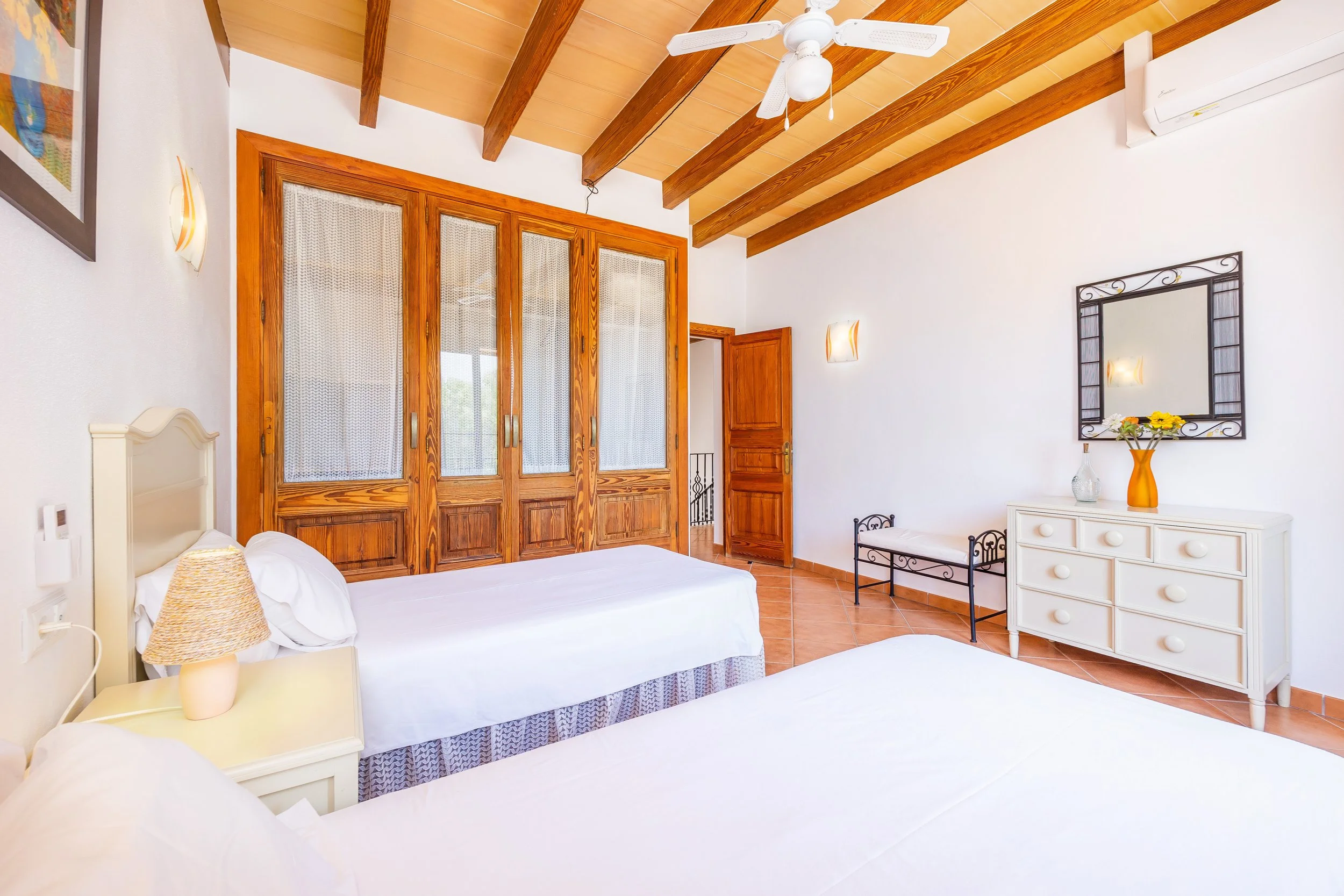 Traditional Mallorcan interior at Can Churi with rustic details and natural light real estate photography