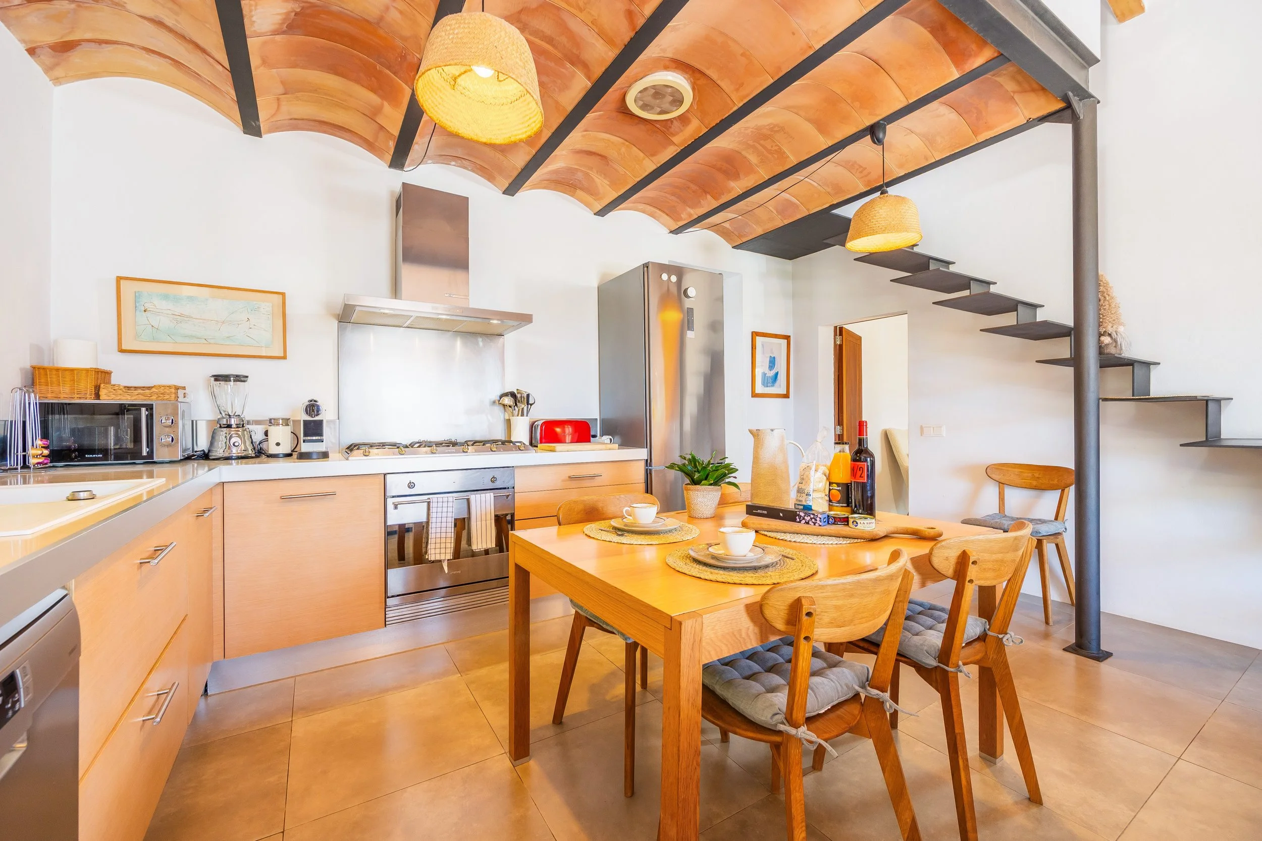 Mountain house interior near Sóller Mallorca renovated with natural light and modern rustic style real estate photography