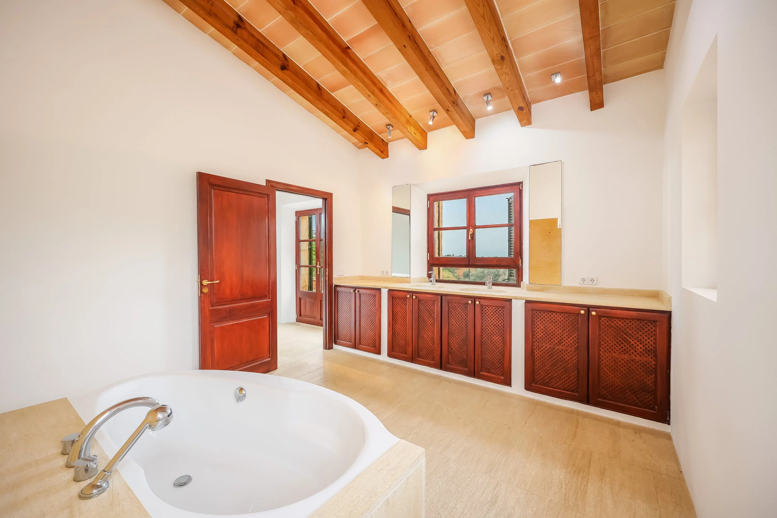 Traditional finca interior near Sant Llorenç Mallorca with rustic architecture and natural light real estate photography