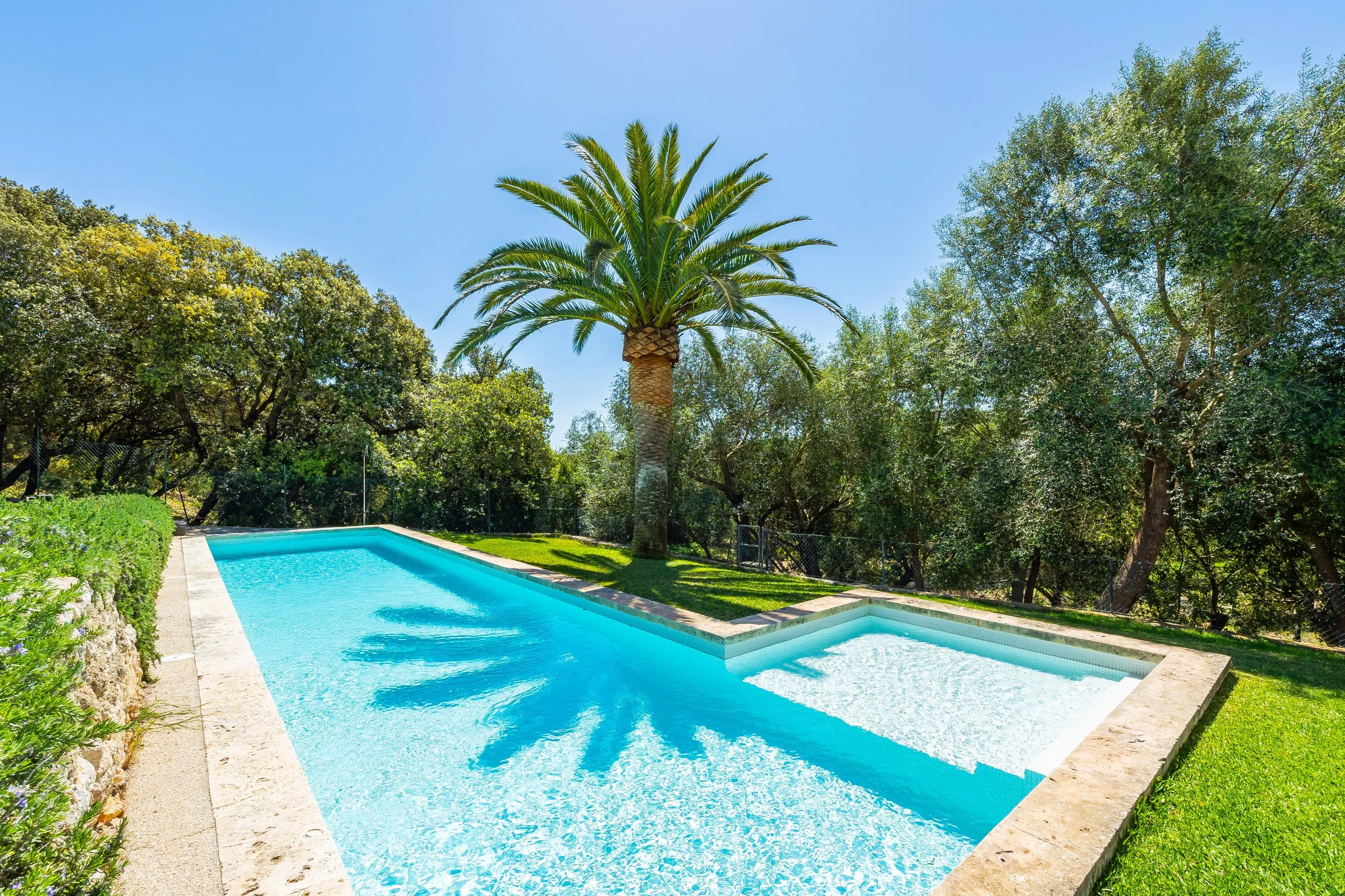 Traditional Mallorcan house with swimming pool near Artà surrounded by countryside real estate photography