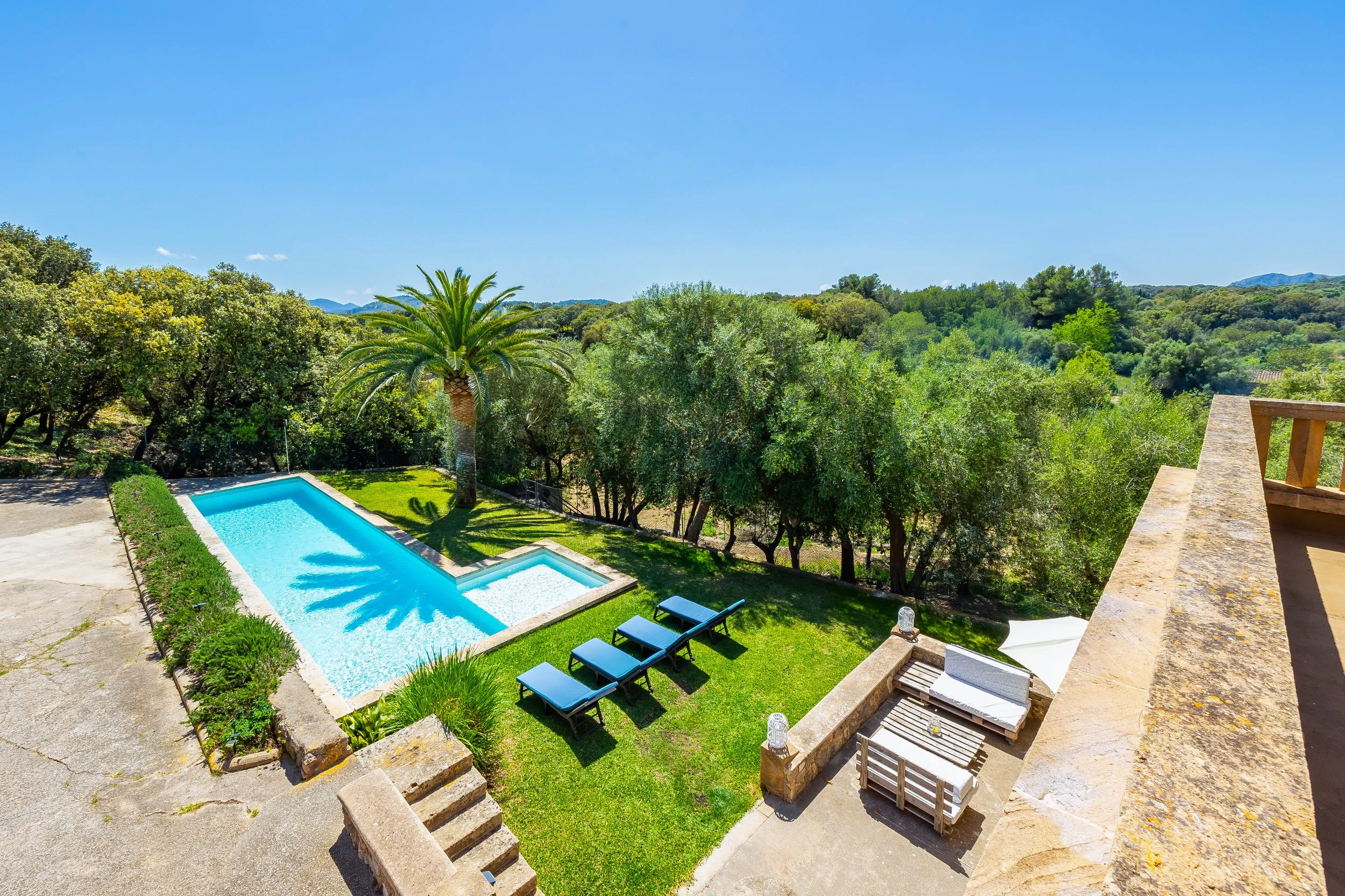 Traditional Mallorcan house with swimming pool near Artà surrounded by countryside real estate photography