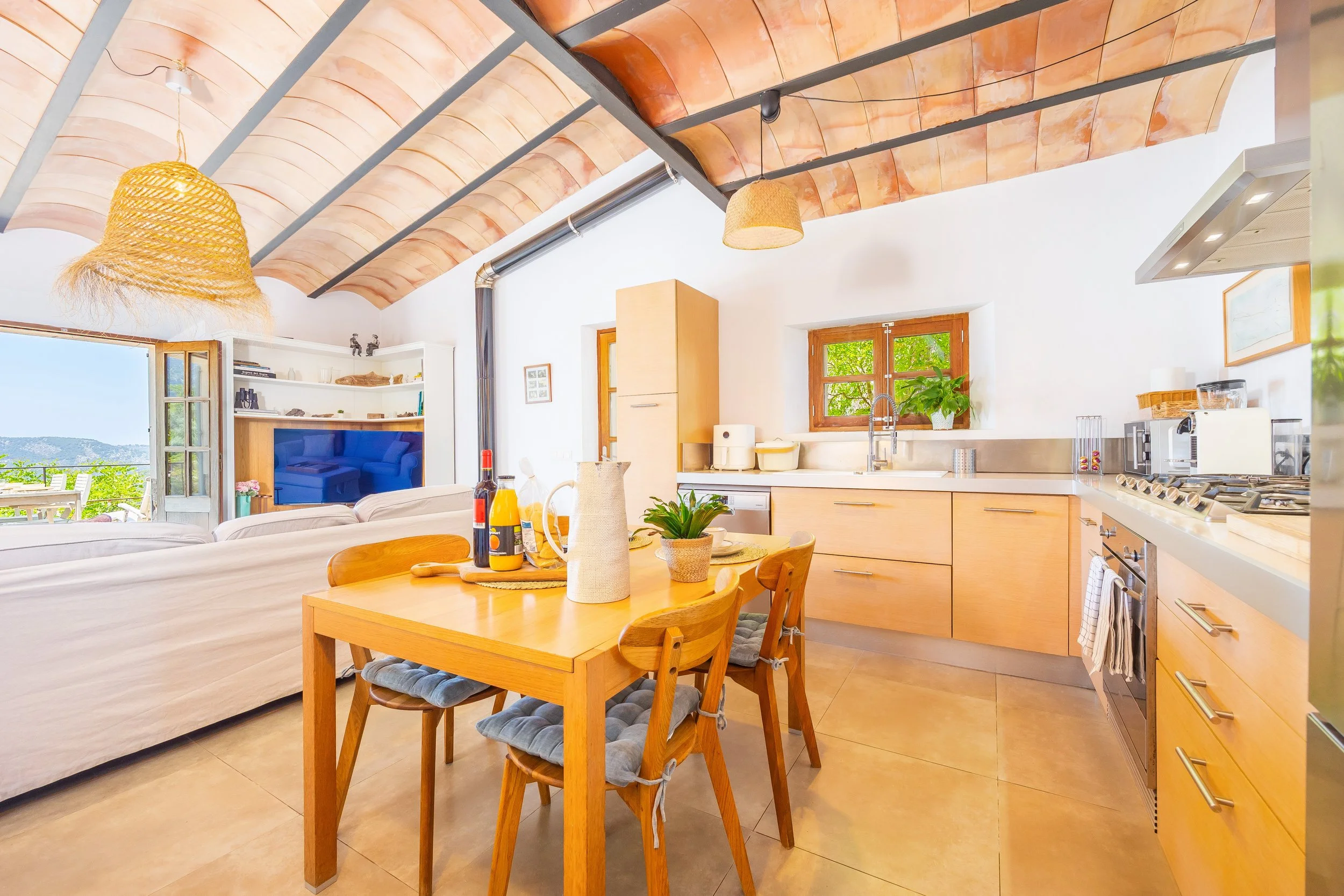 Mountain house interior near Sóller Mallorca renovated with natural light and modern rustic style real estate photography