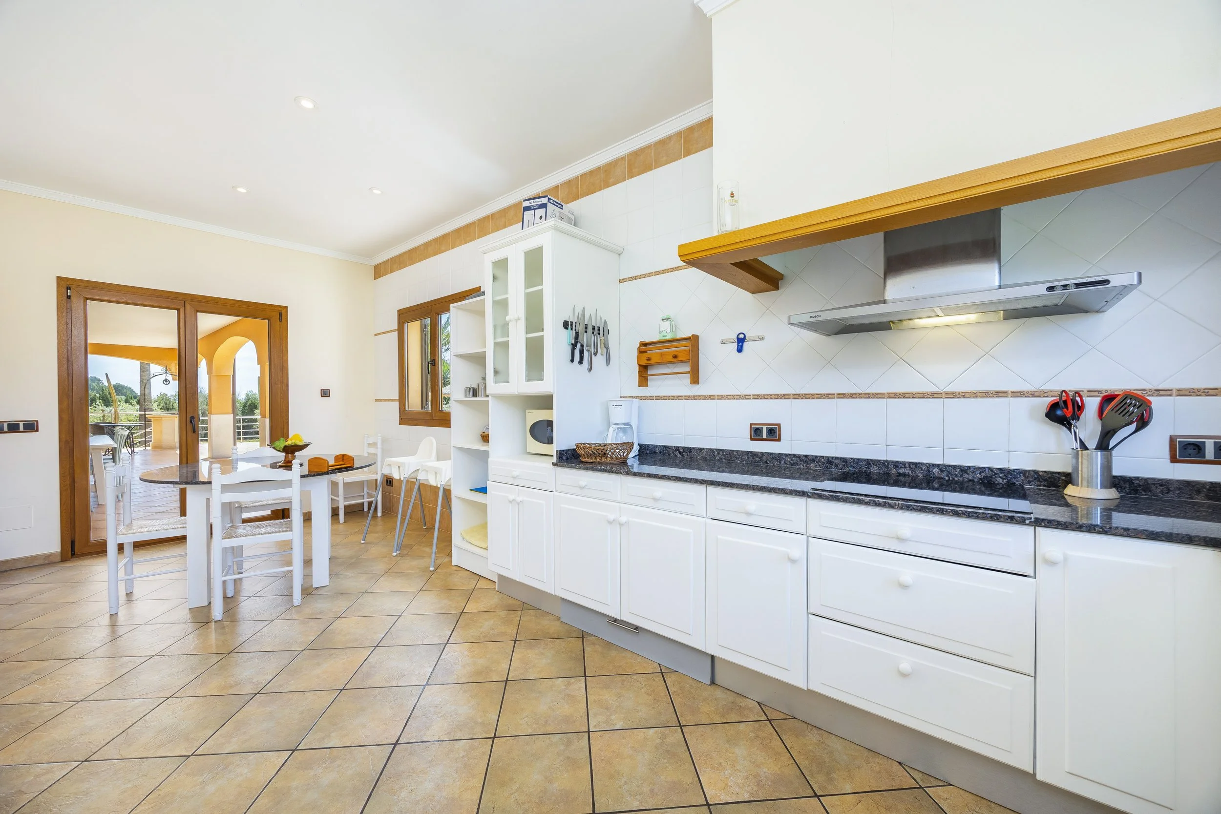 Rural house interior near Ses Salines Mallorca with natural light and traditional Mediterranean design real estate photography